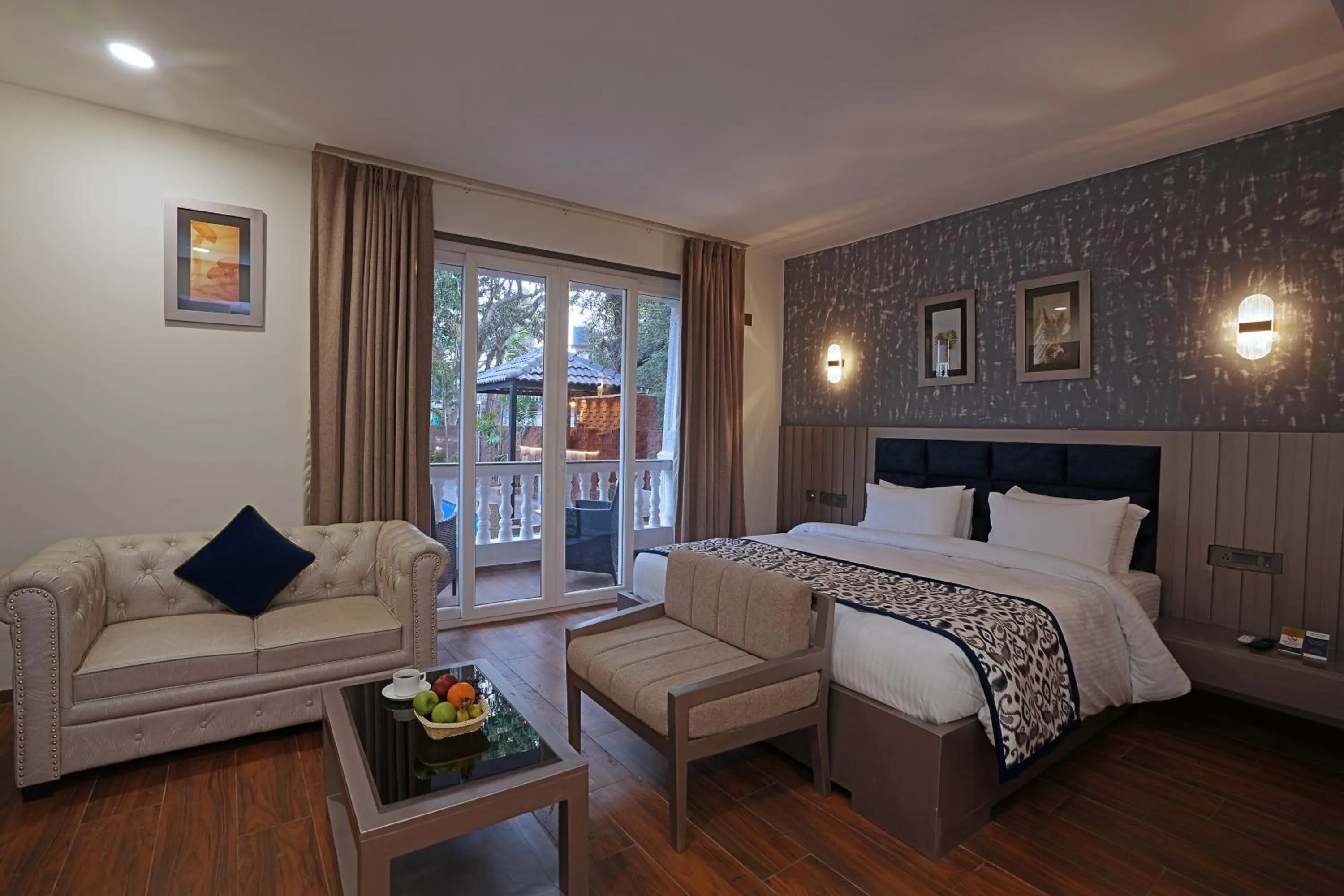 Bedroom, Bed in Grand Continent Anjuna A Sarovar Portico Affiliate Hotel