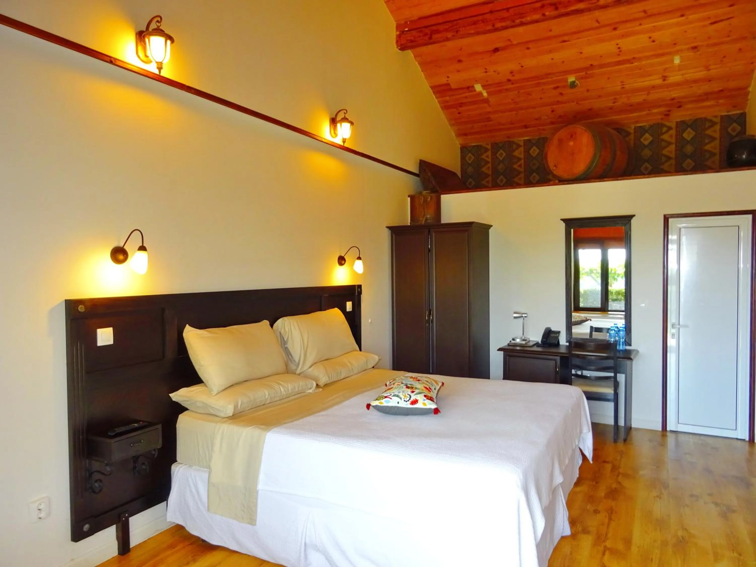 Decorative detail, Bed in Seven Generations Winery Hotel