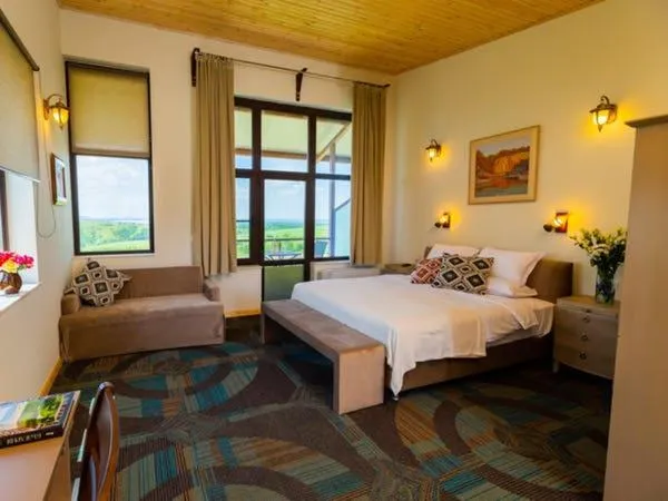 Bed in Seven Generations Winery Hotel