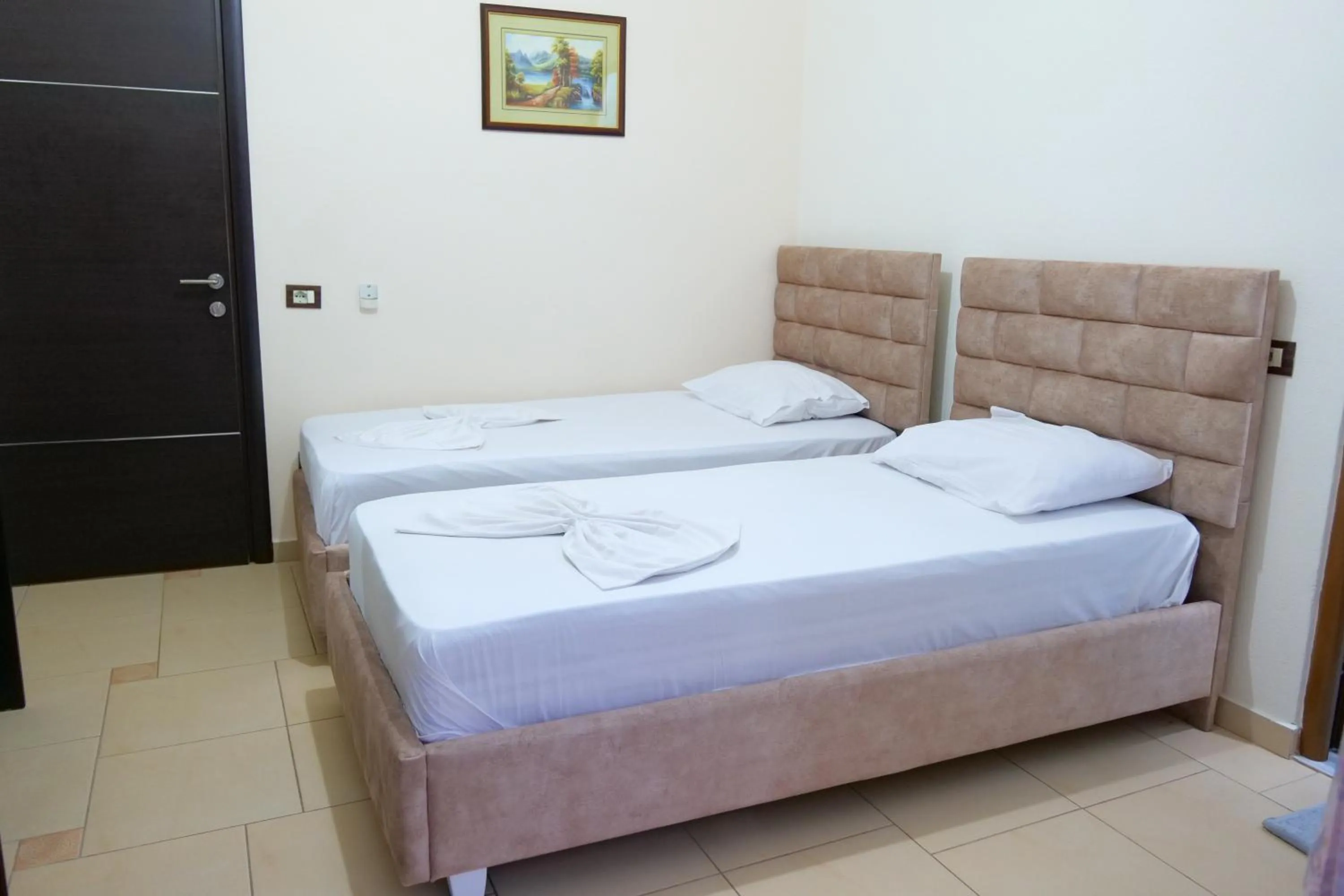 Bed in Hotel Rixhi