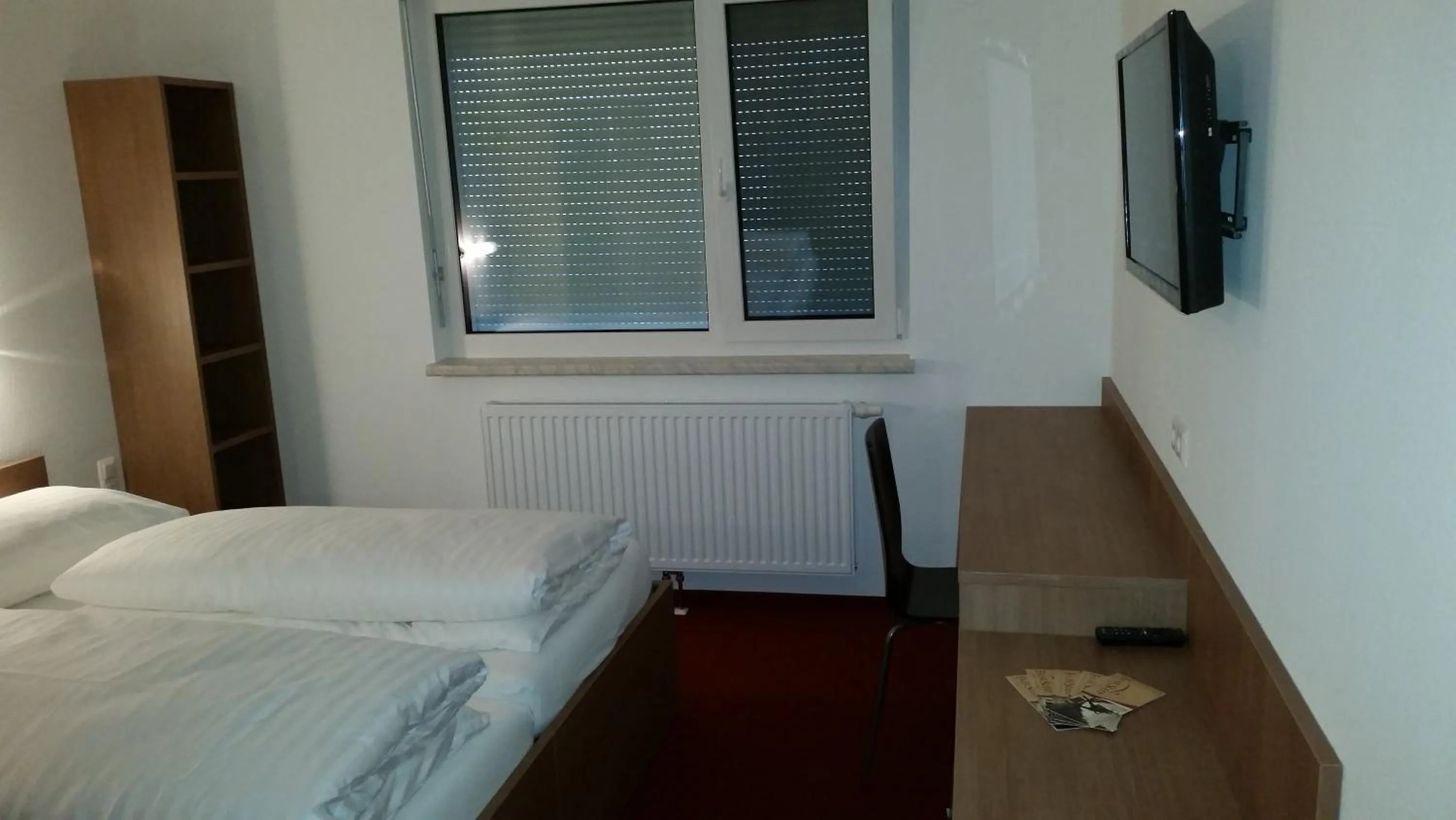 Bed in FairSleep Motel Hainburg