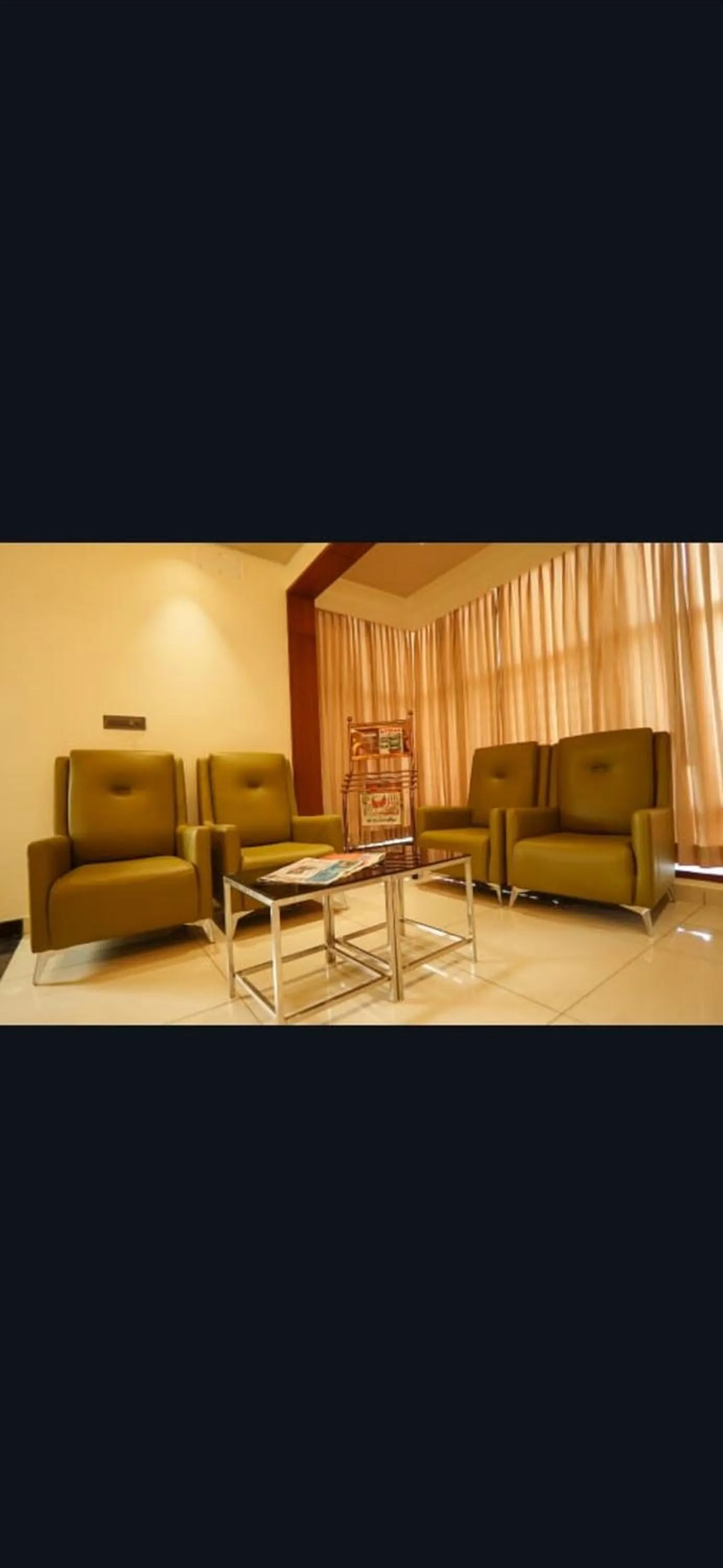 Seating area in Hotel Harigovindas Express Mysore