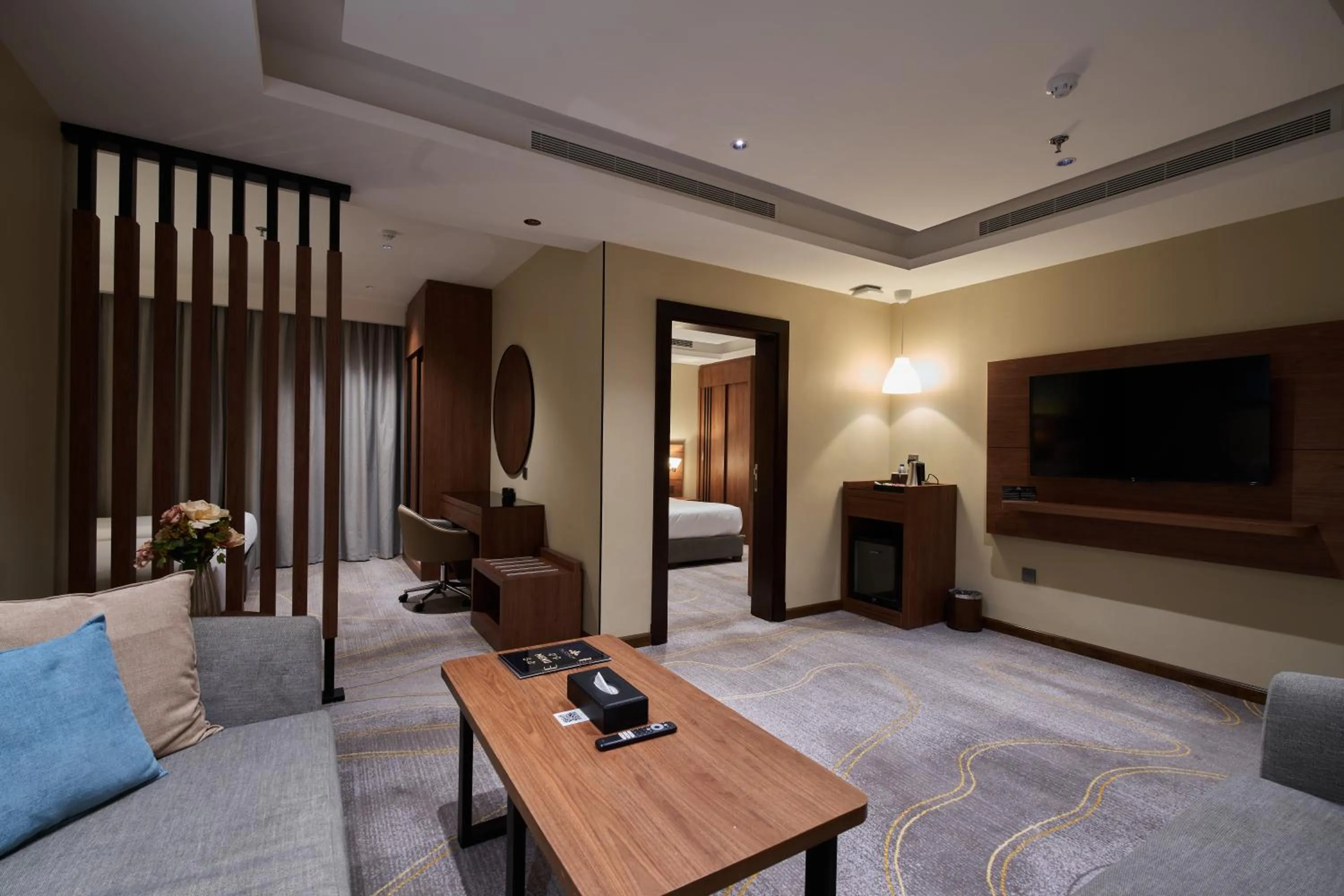 Communal lounge/ TV room, Bed in Platinum Hotel