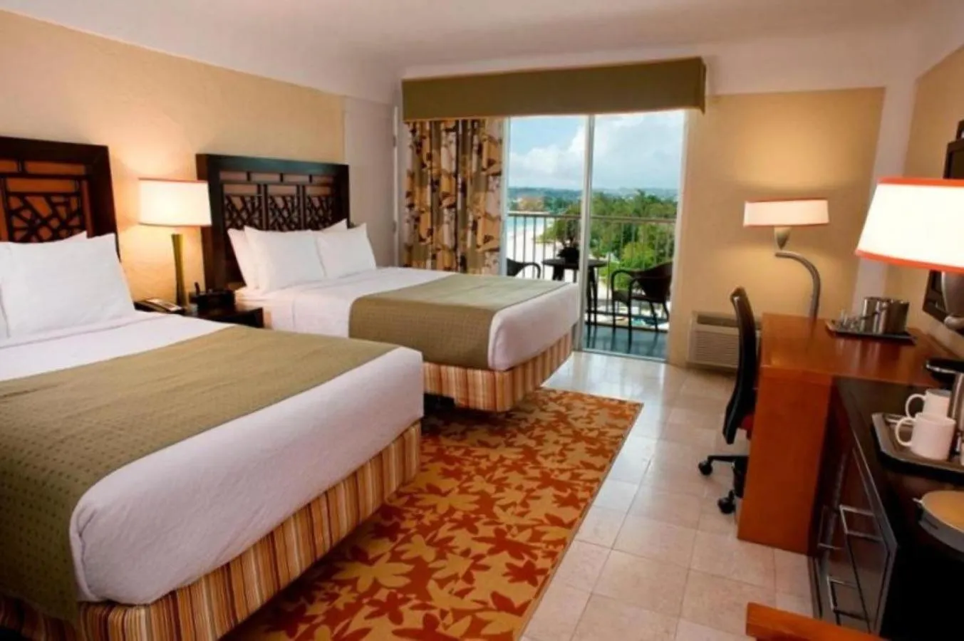 Photo of the whole room, Bed in Radisson Aquatica Resort Barbados