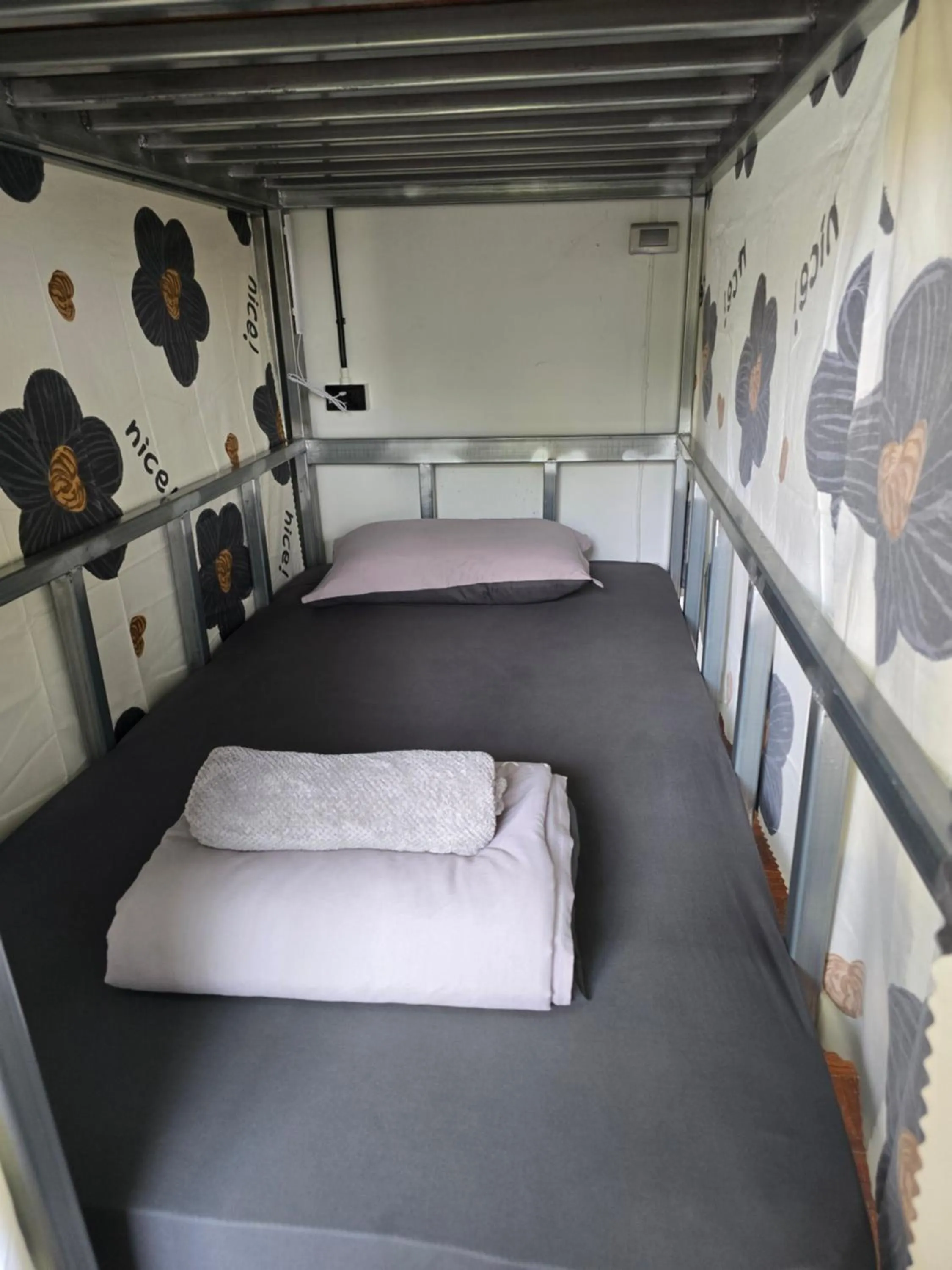 Bed in Panda Lodge Home Stay