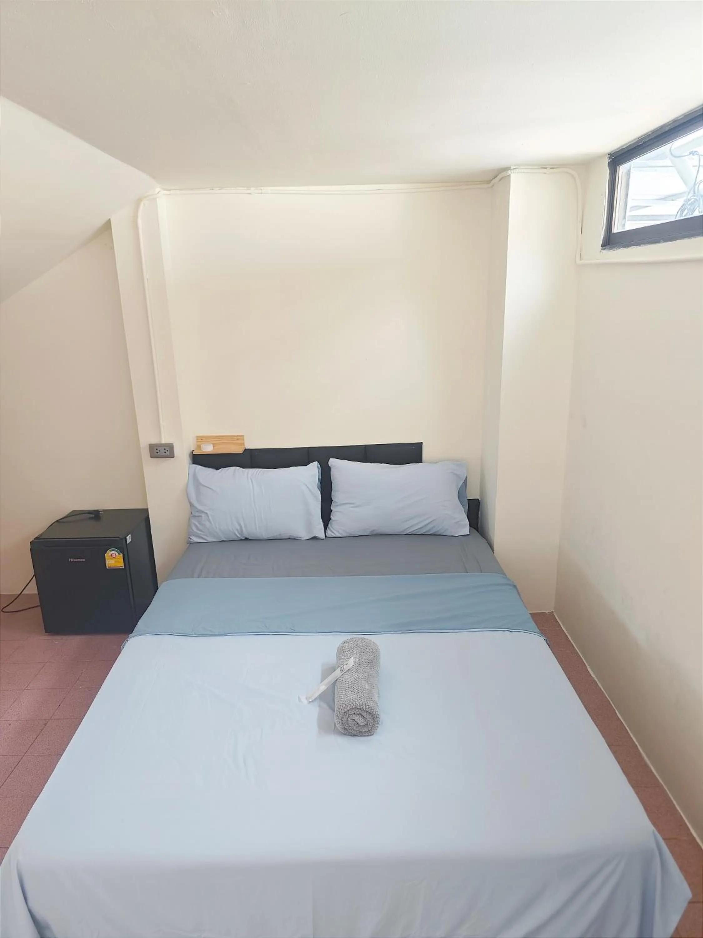 Bed in Panda Lodge Home Stay