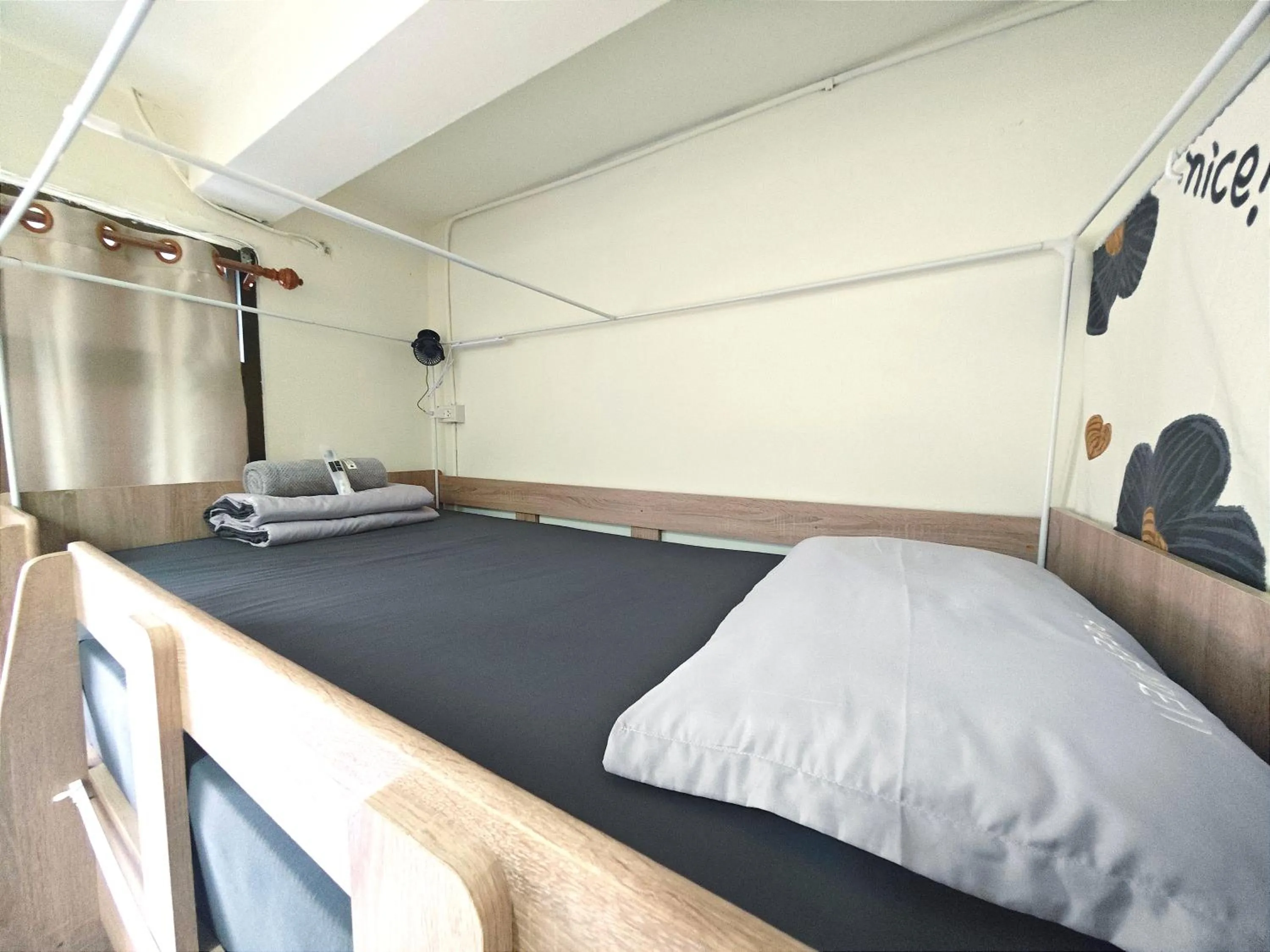 Bed in Panda Lodge Home Stay