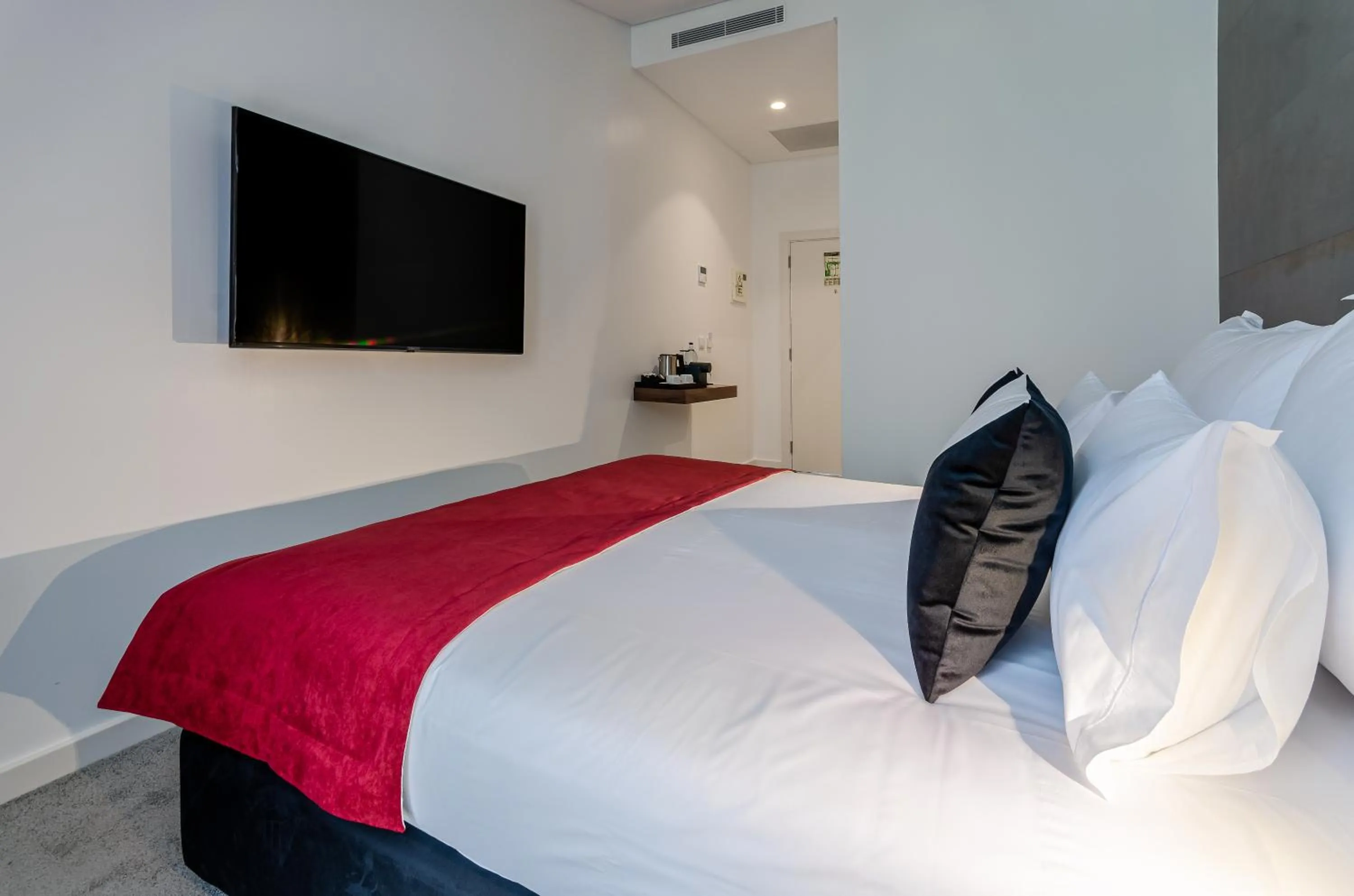 Bed in 2M BOUTIQUE HOTEL