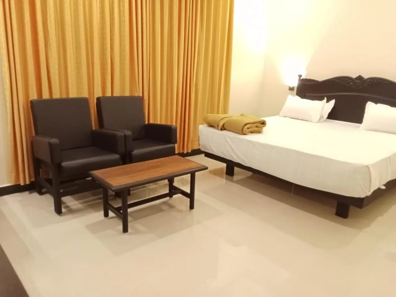 Bed in Hotel Sri Devi