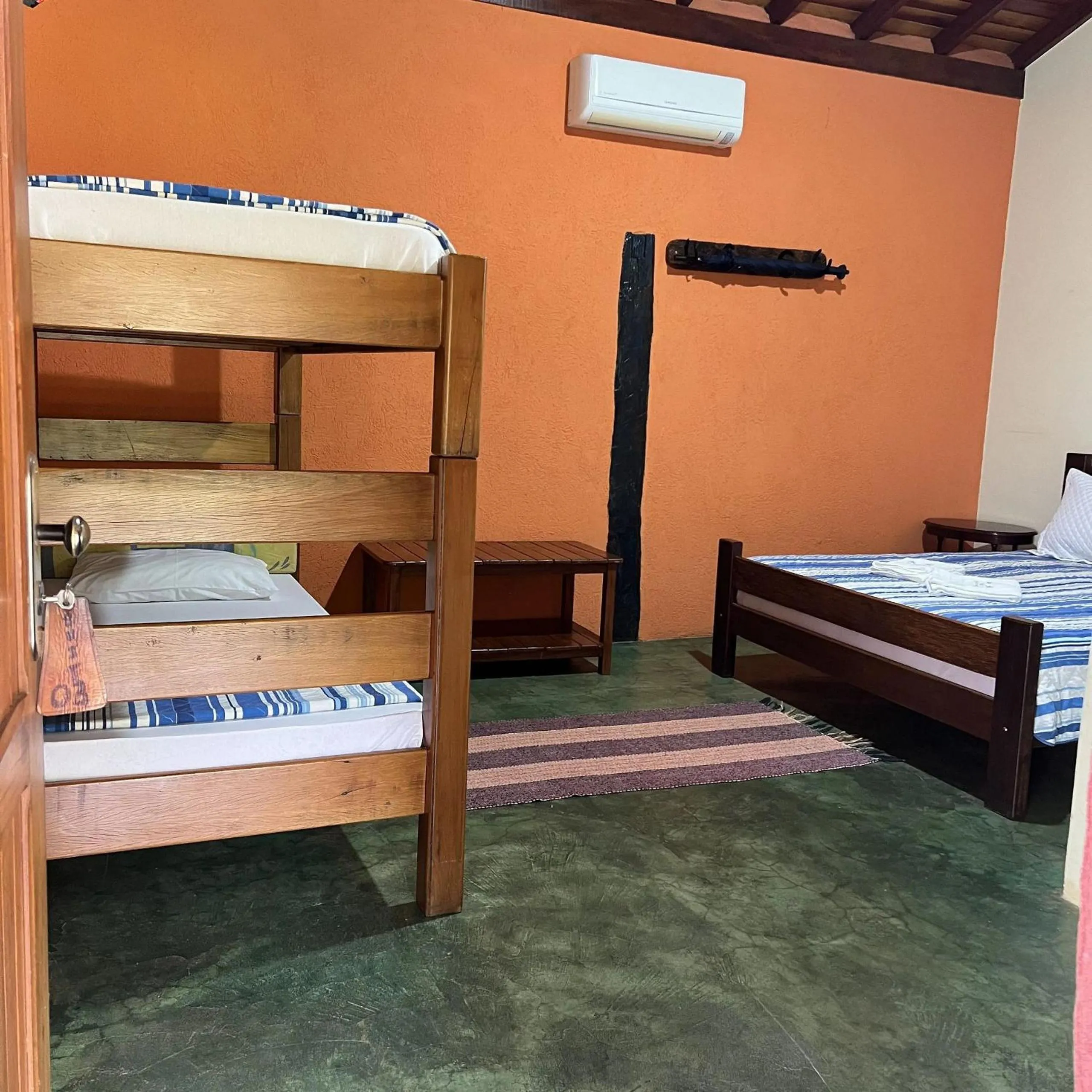 Bed in Pousada Recanto Janbor