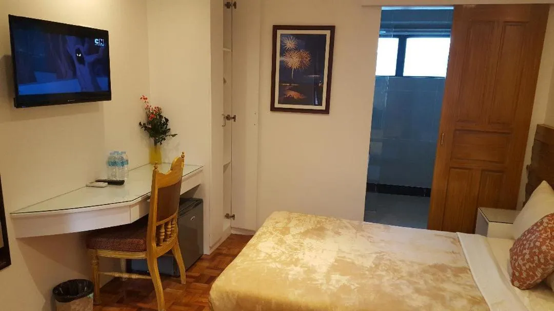 Bed in Gervasia Hotel Makati