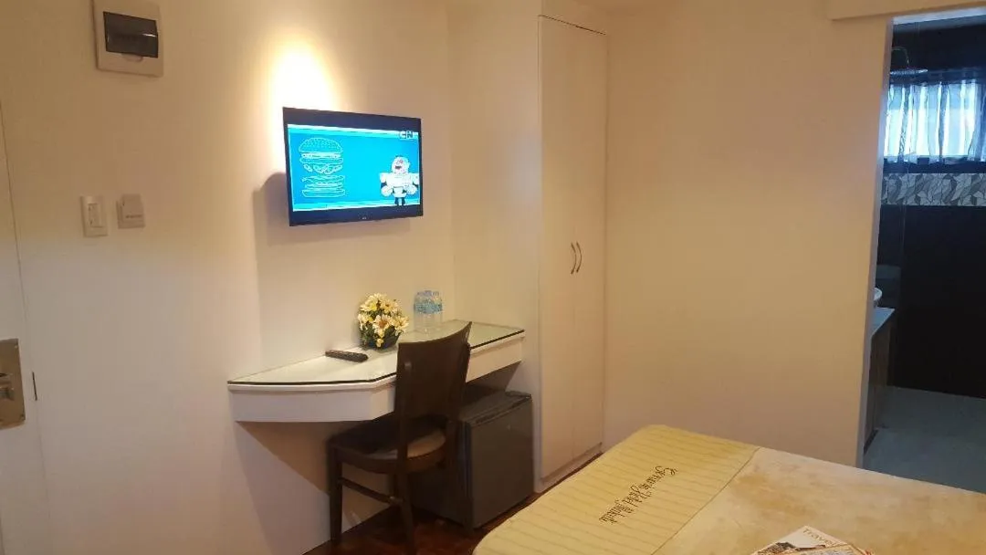 Bed in Gervasia Hotel Makati