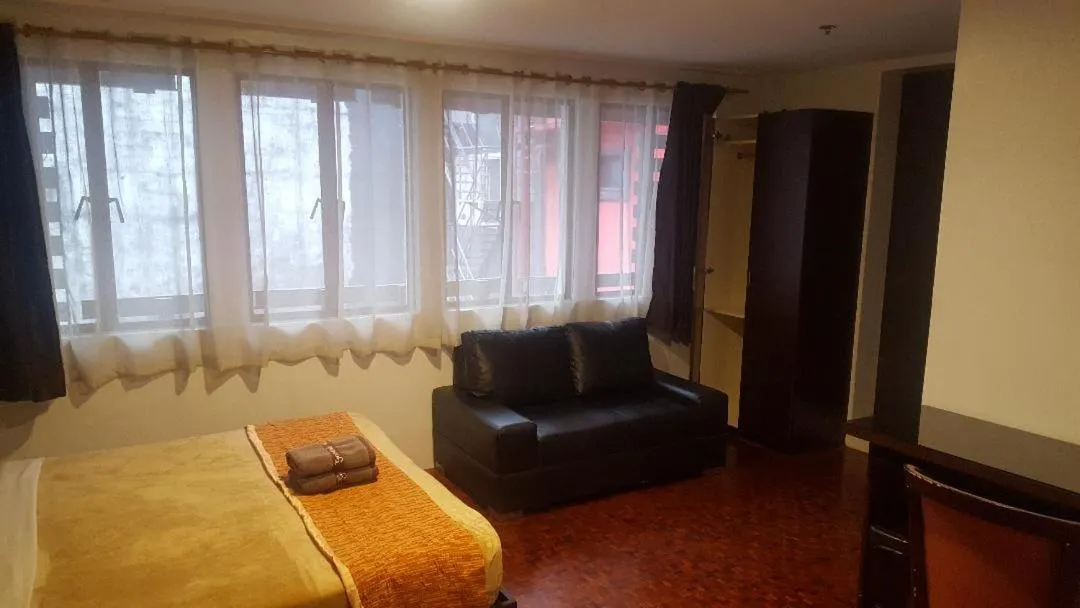 Bed in Gervasia Hotel Makati