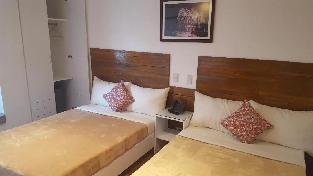 Bed in Gervasia Hotel Makati