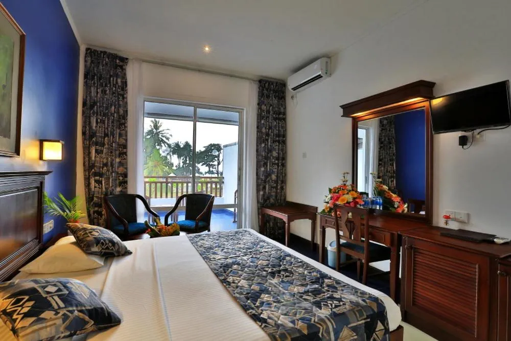 Photo of the whole room, Bed in Hibiscus Beach Hotel & Villas