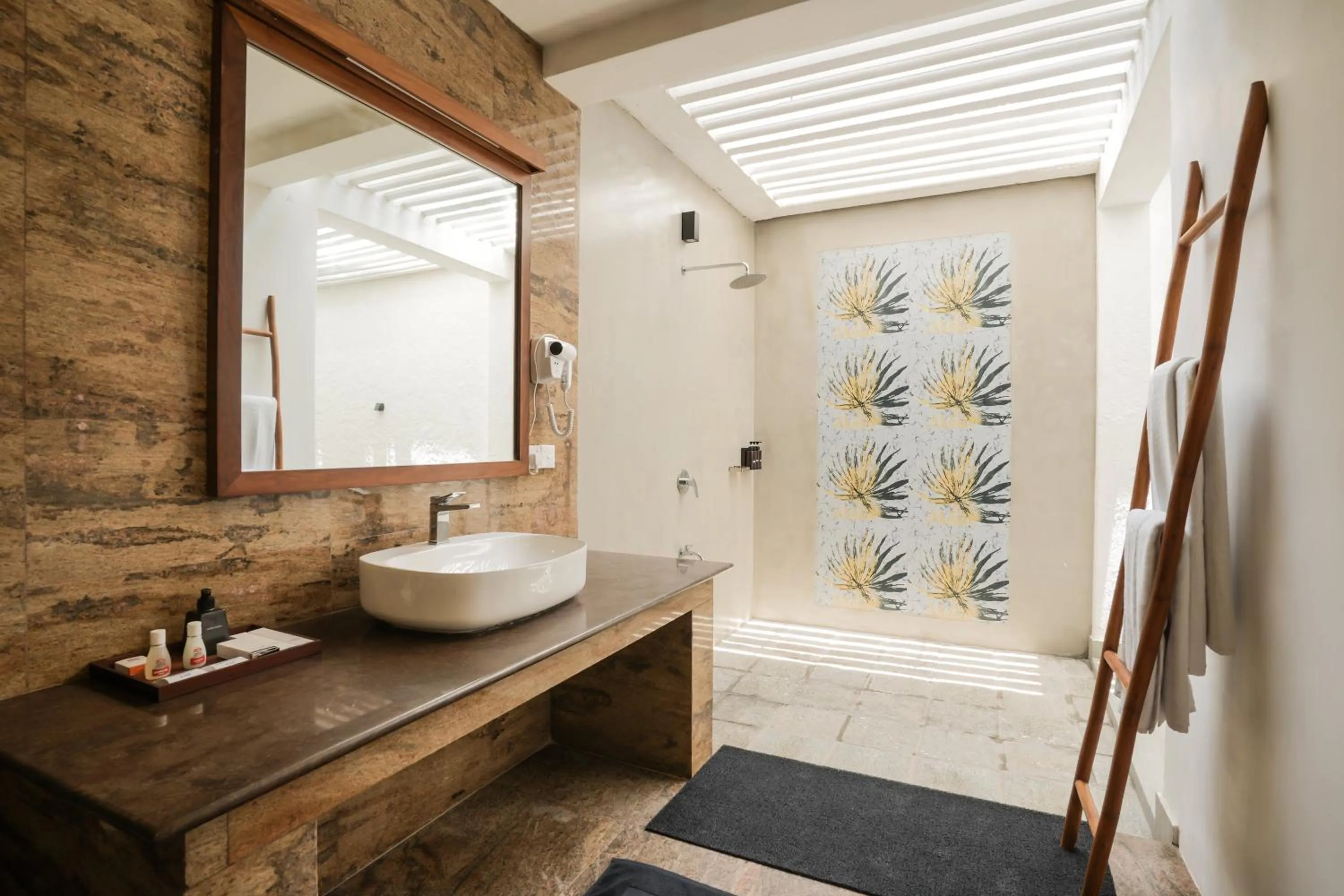 Bathroom in Hibiscus Beach Hotel & Villas