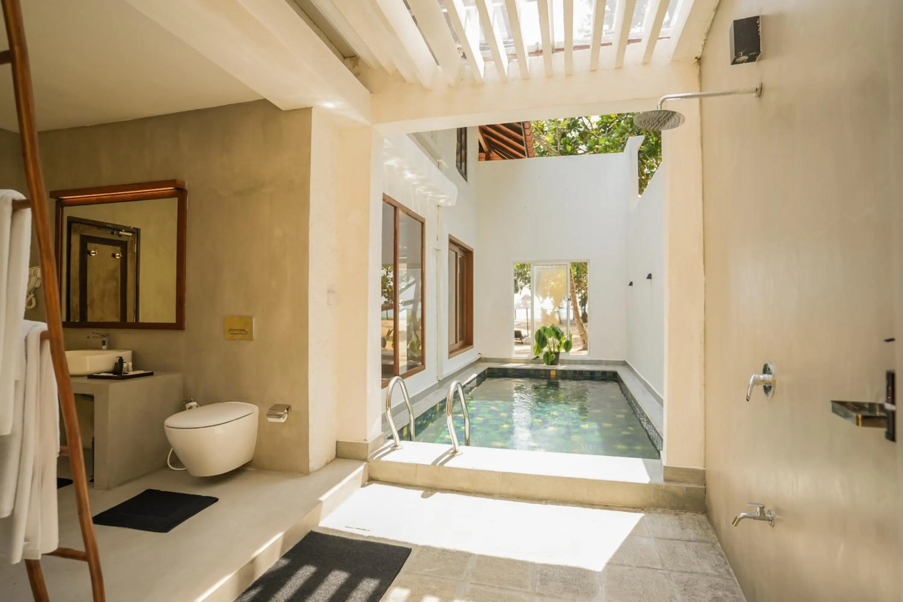 Bathroom in Hibiscus Beach Hotel & Villas