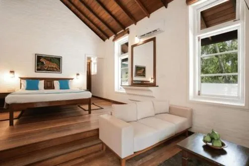 Bed in Hibiscus Beach Hotel & Villas