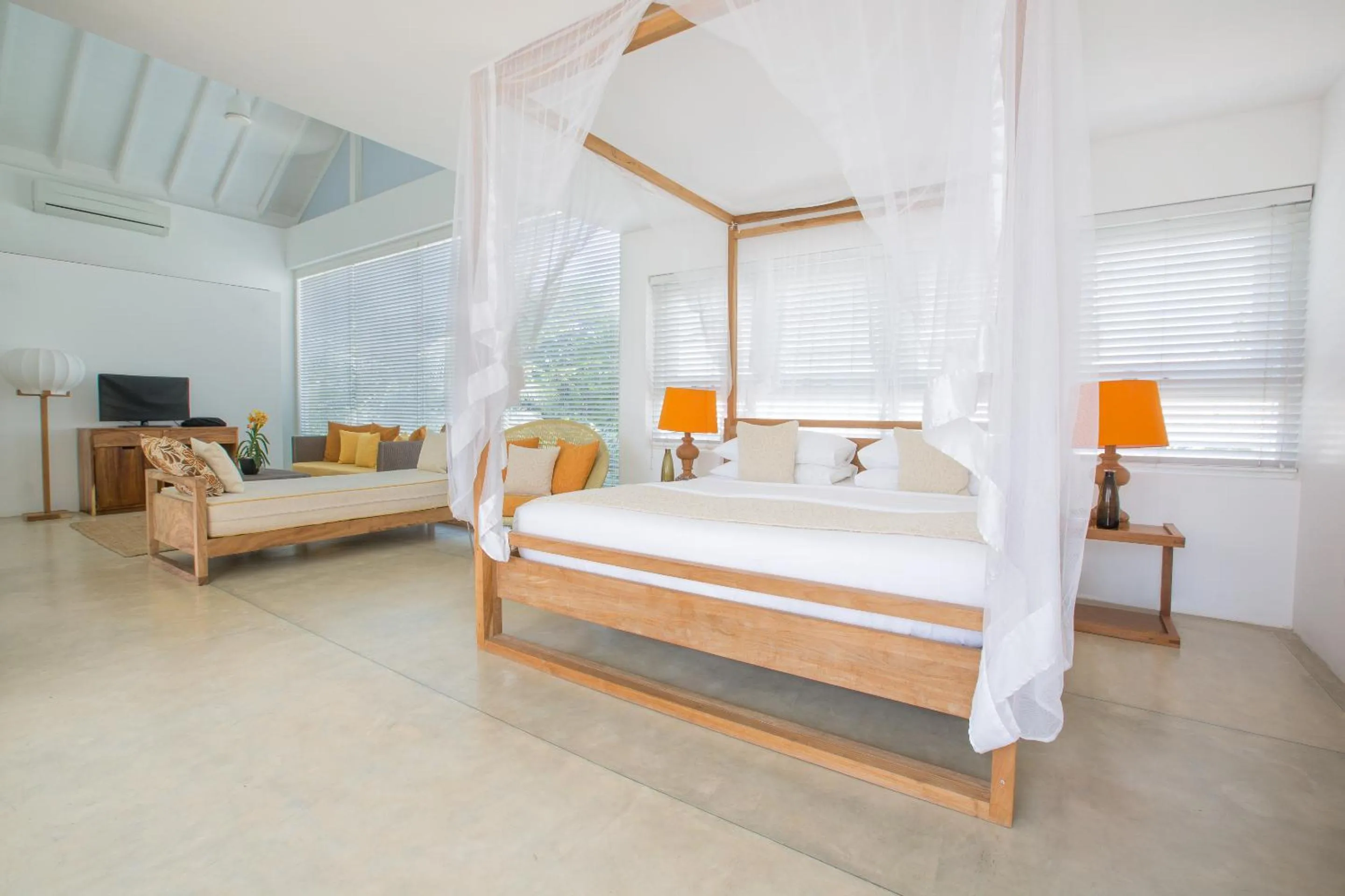 Bed in Sri Sharavi Beach Villas & Spa - with 43 metre saltwater infinity pool