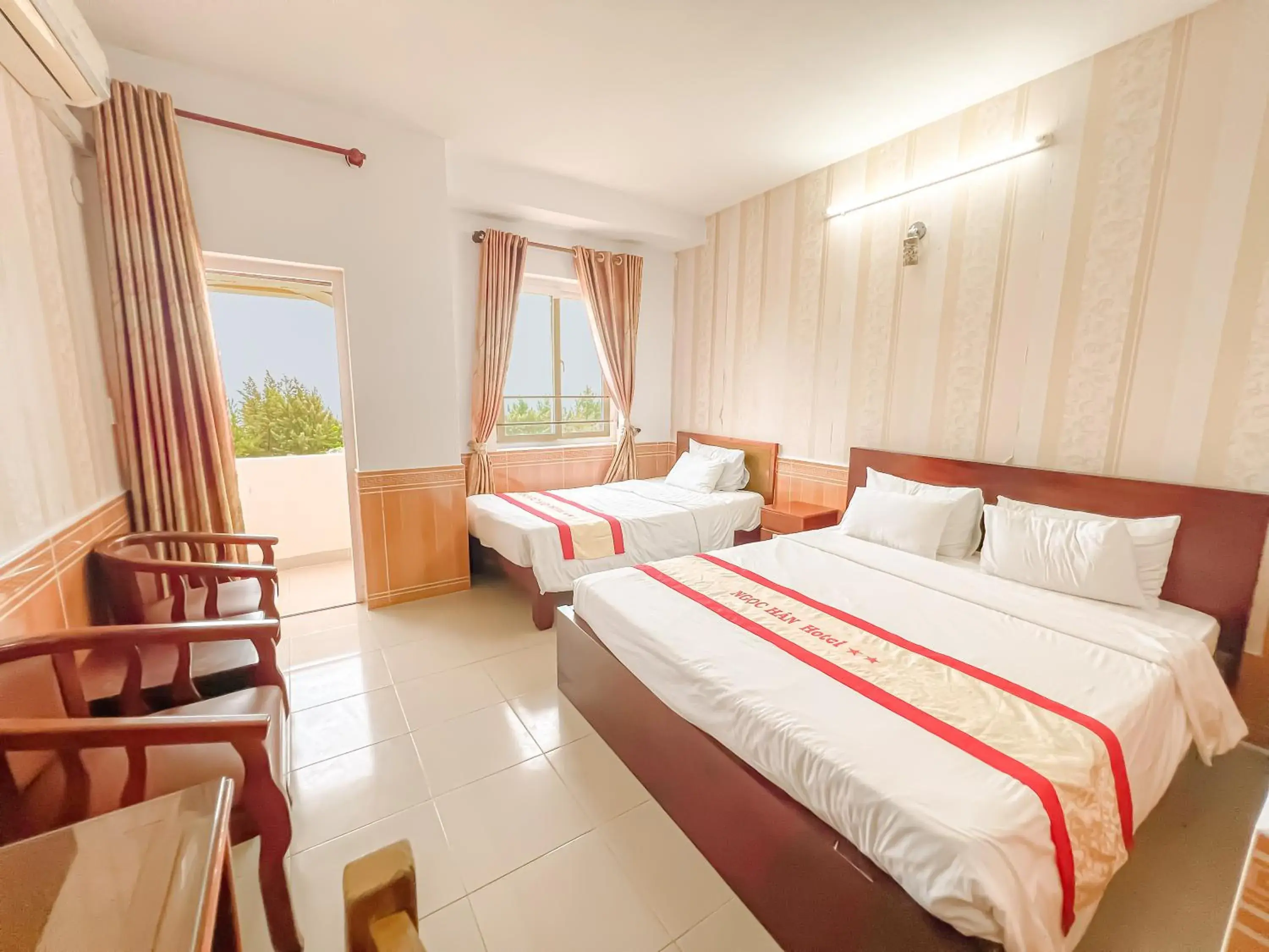 Triple Room with Balcony in Ngọc Hân Hotel By The Moment Triple Room with Balcony in Ngọc Hân Hotel By The Moment
