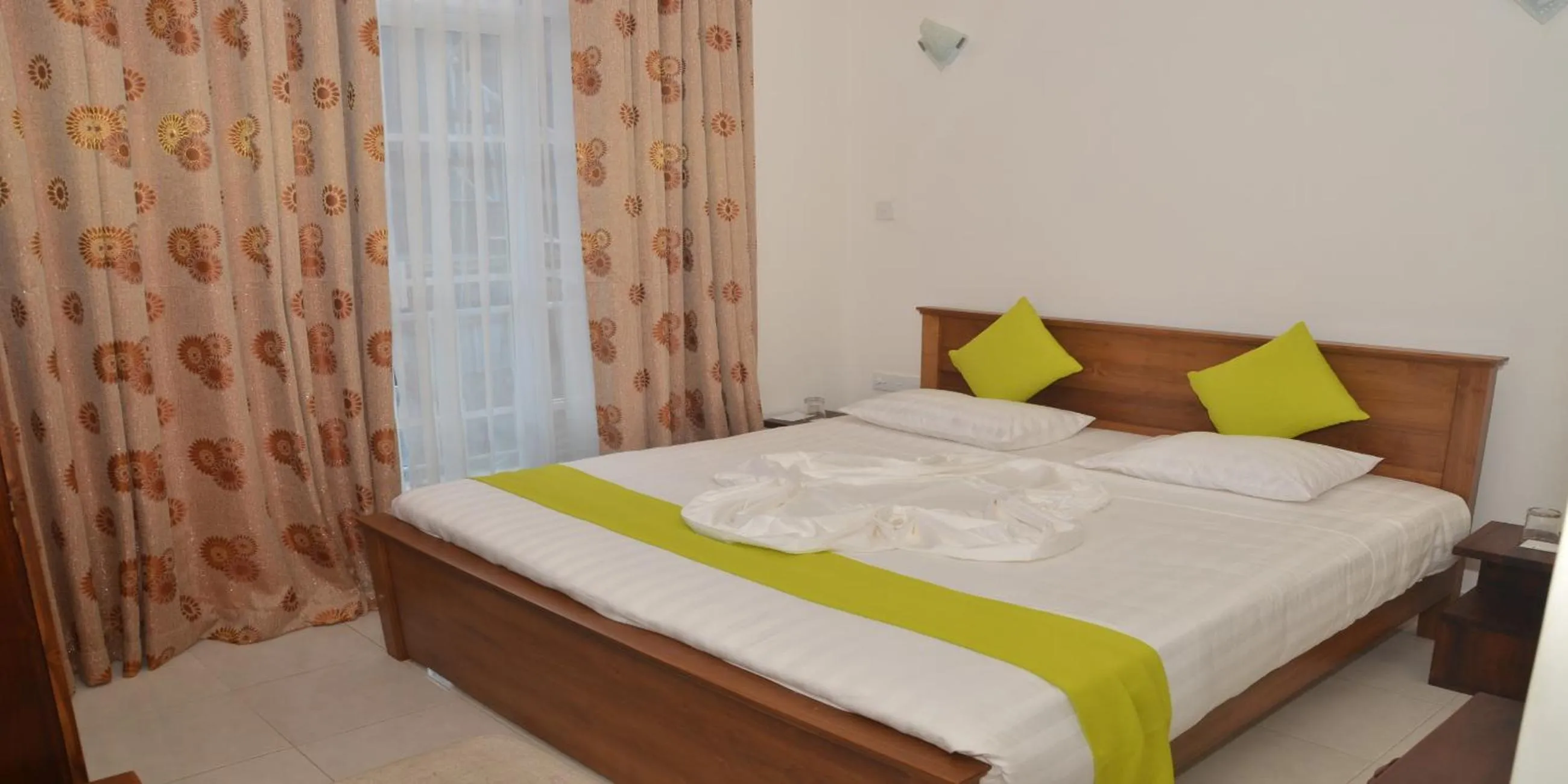 Bed in Auslink Hotel