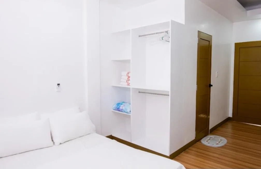 Bed in E and C tourist inn