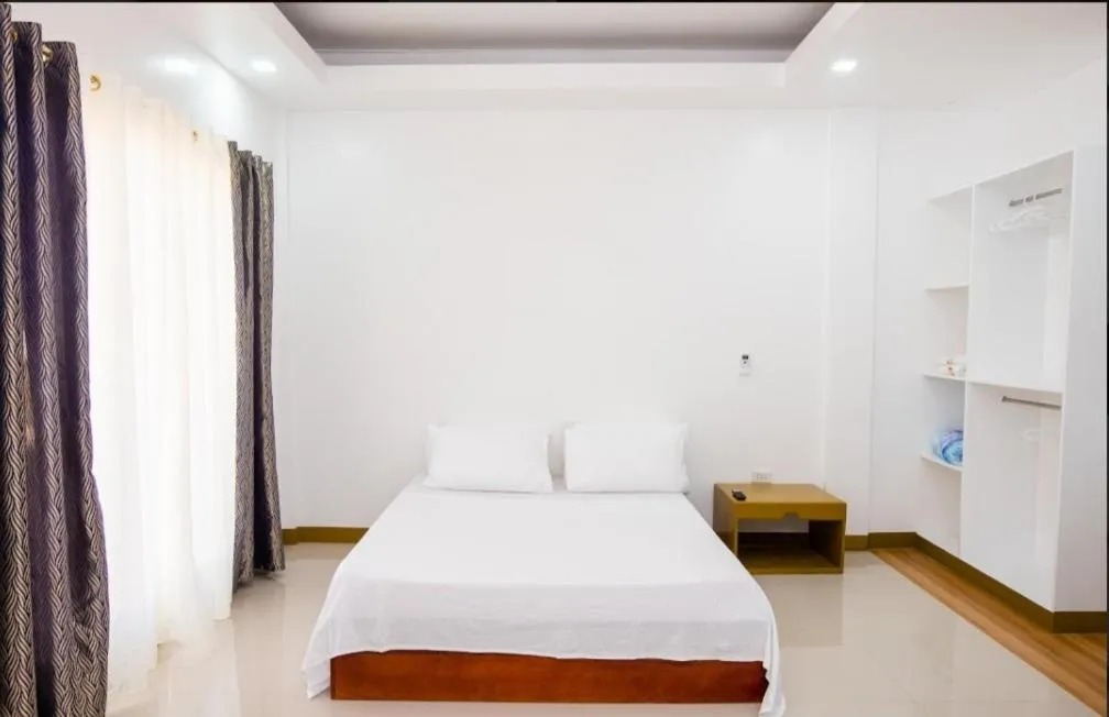 Bed in E and C tourist inn