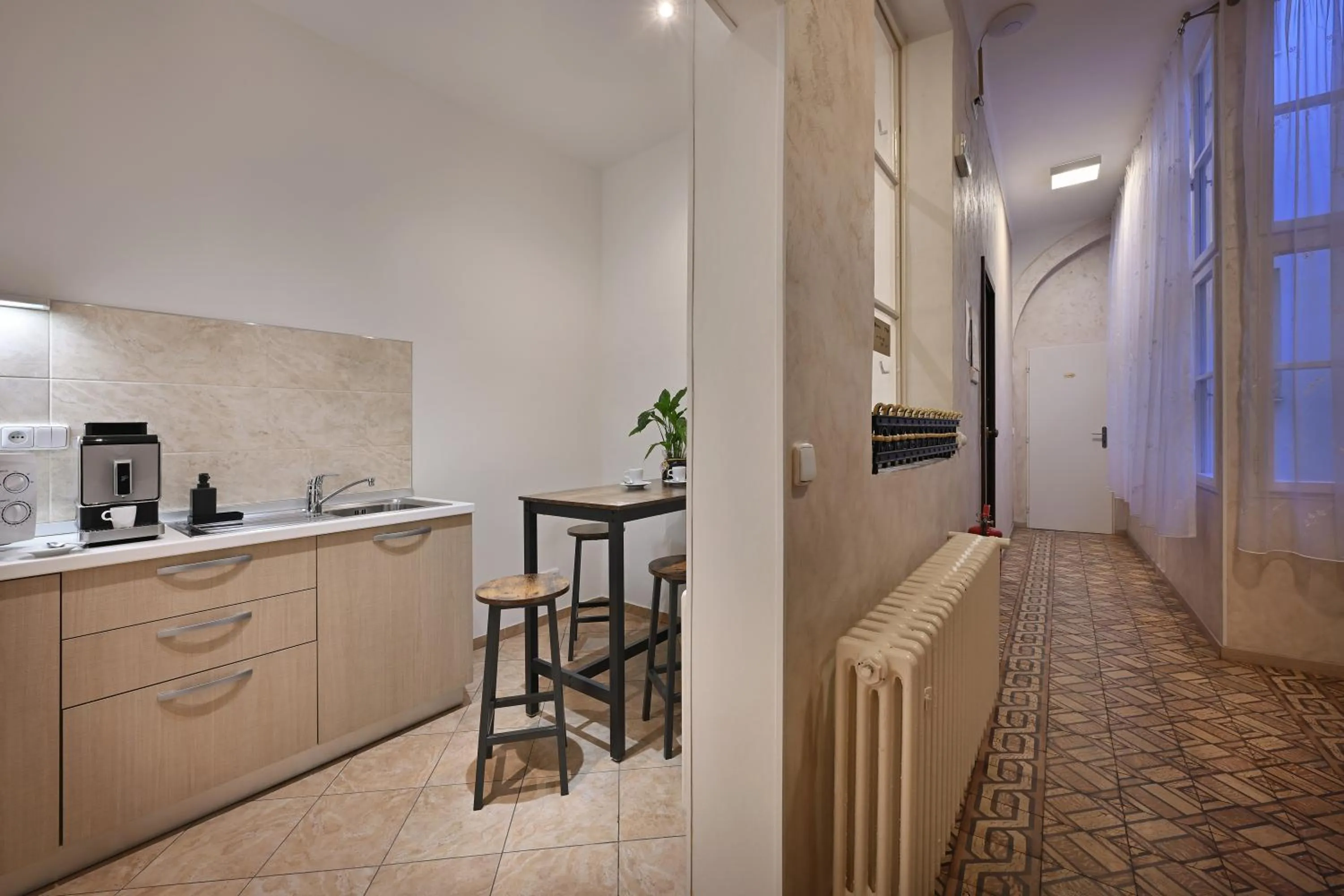 Communal kitchen in Boutique Residence by Little King