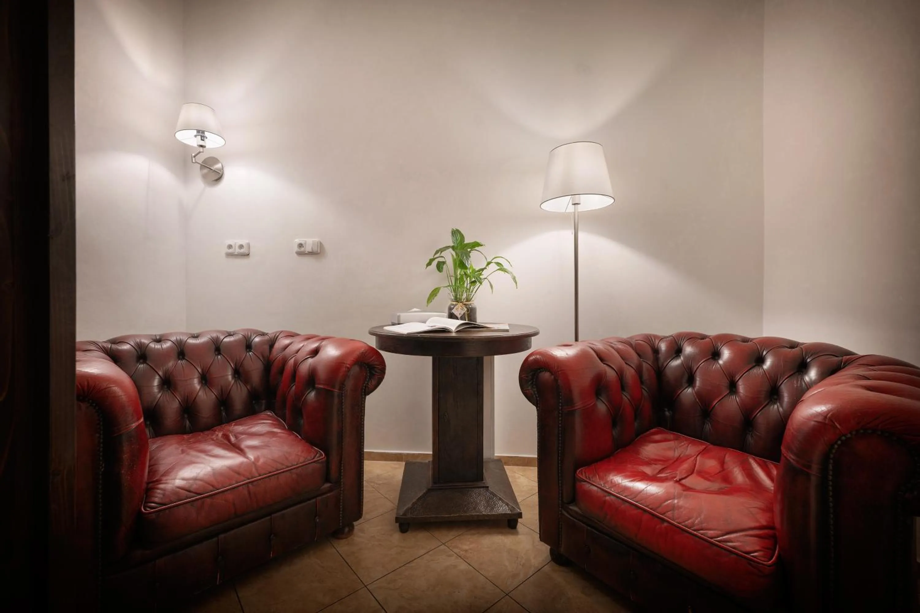 Seating area in Boutique Residence by Little King