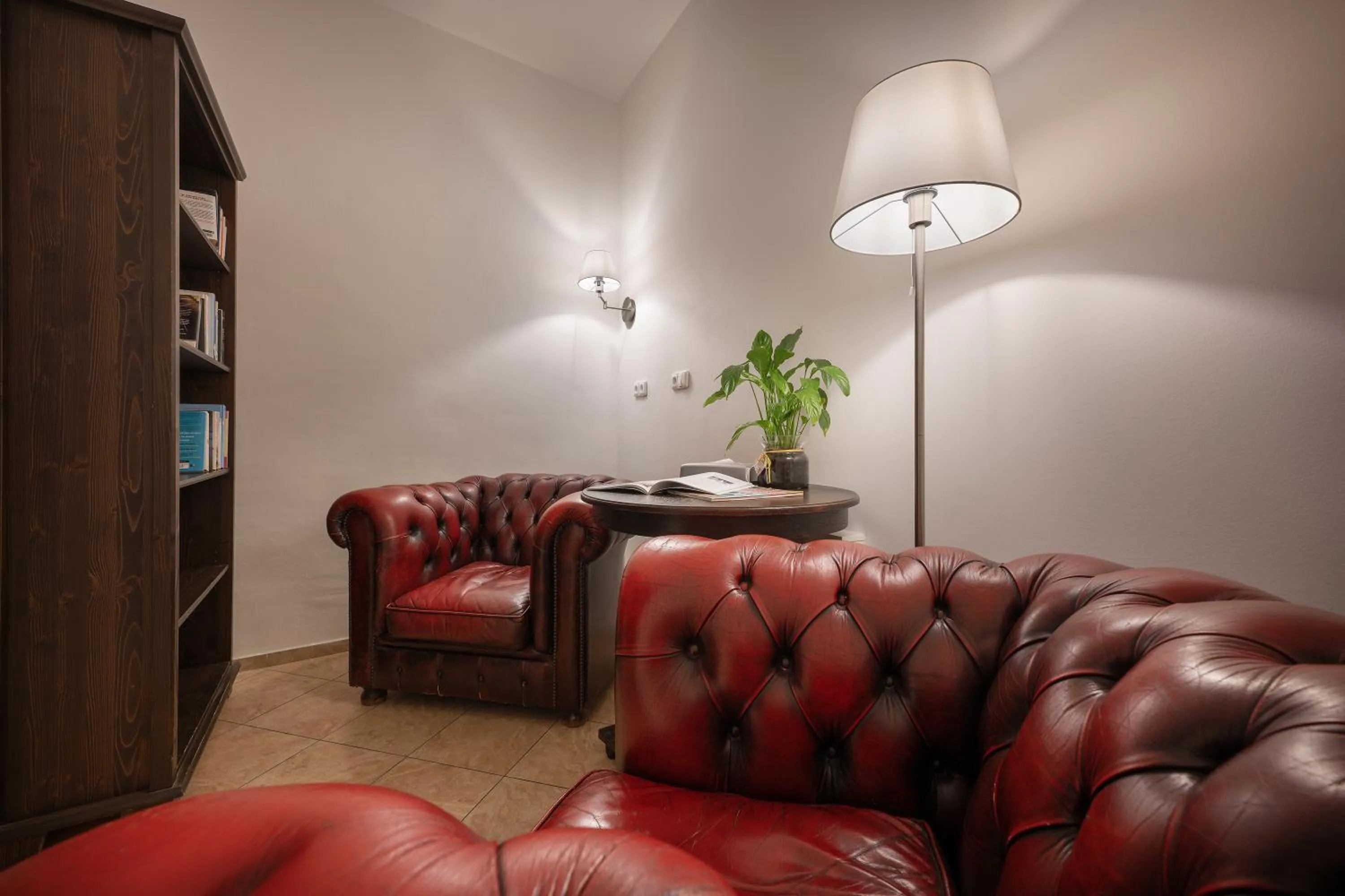 Seating area in Boutique Residence by Little King