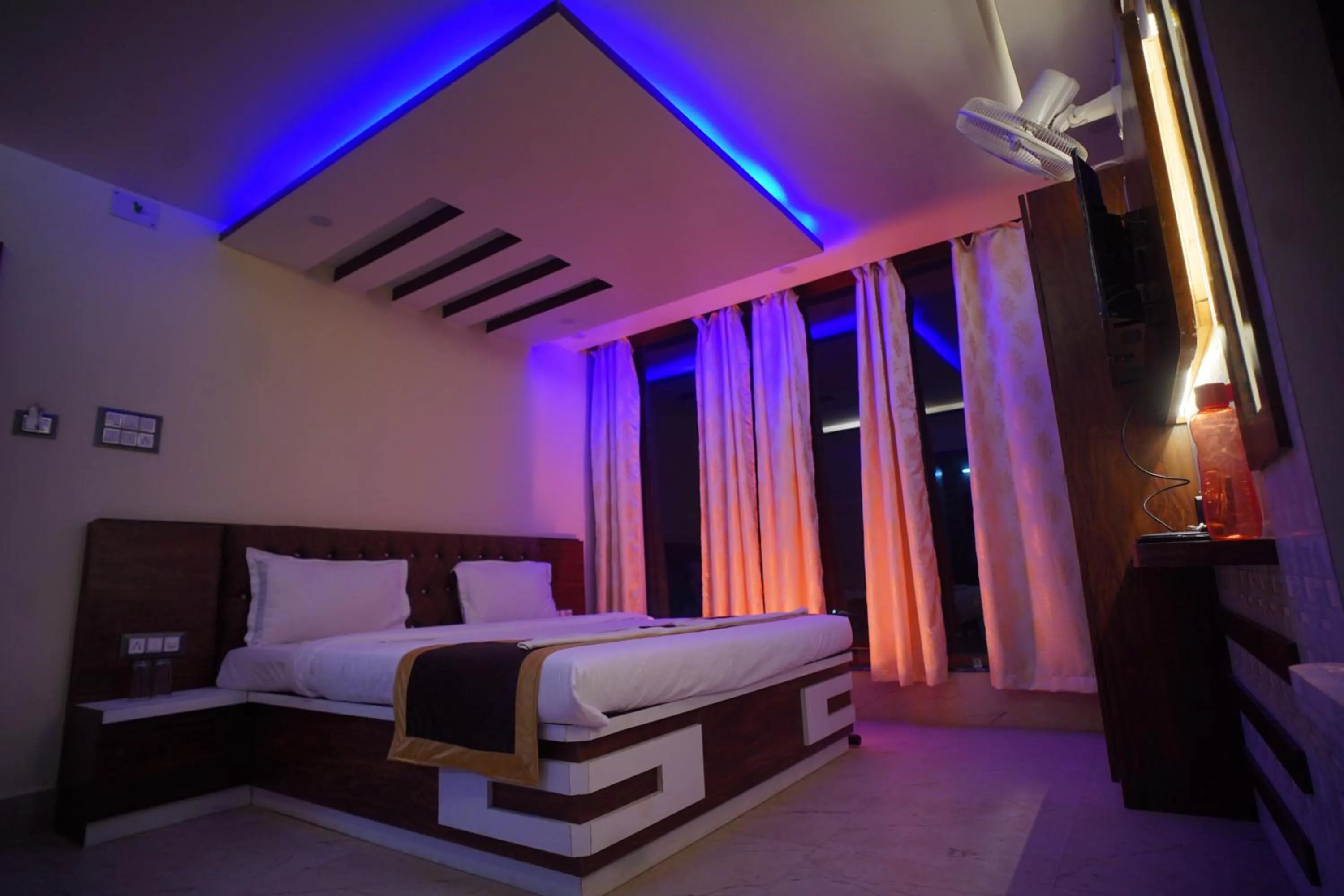 Bedroom in Hotel Asha Inn