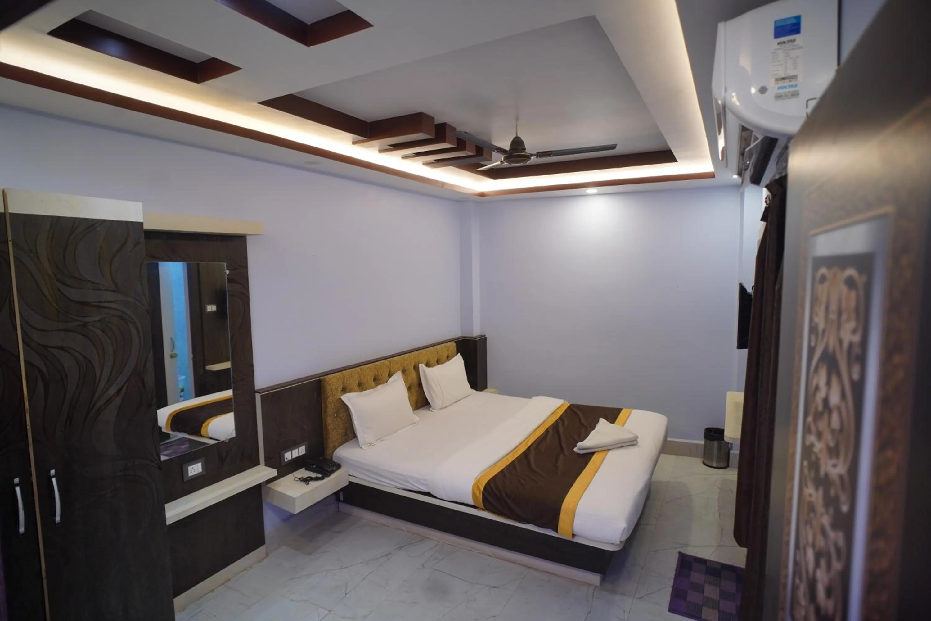 Bedroom in Hotel Asha Inn