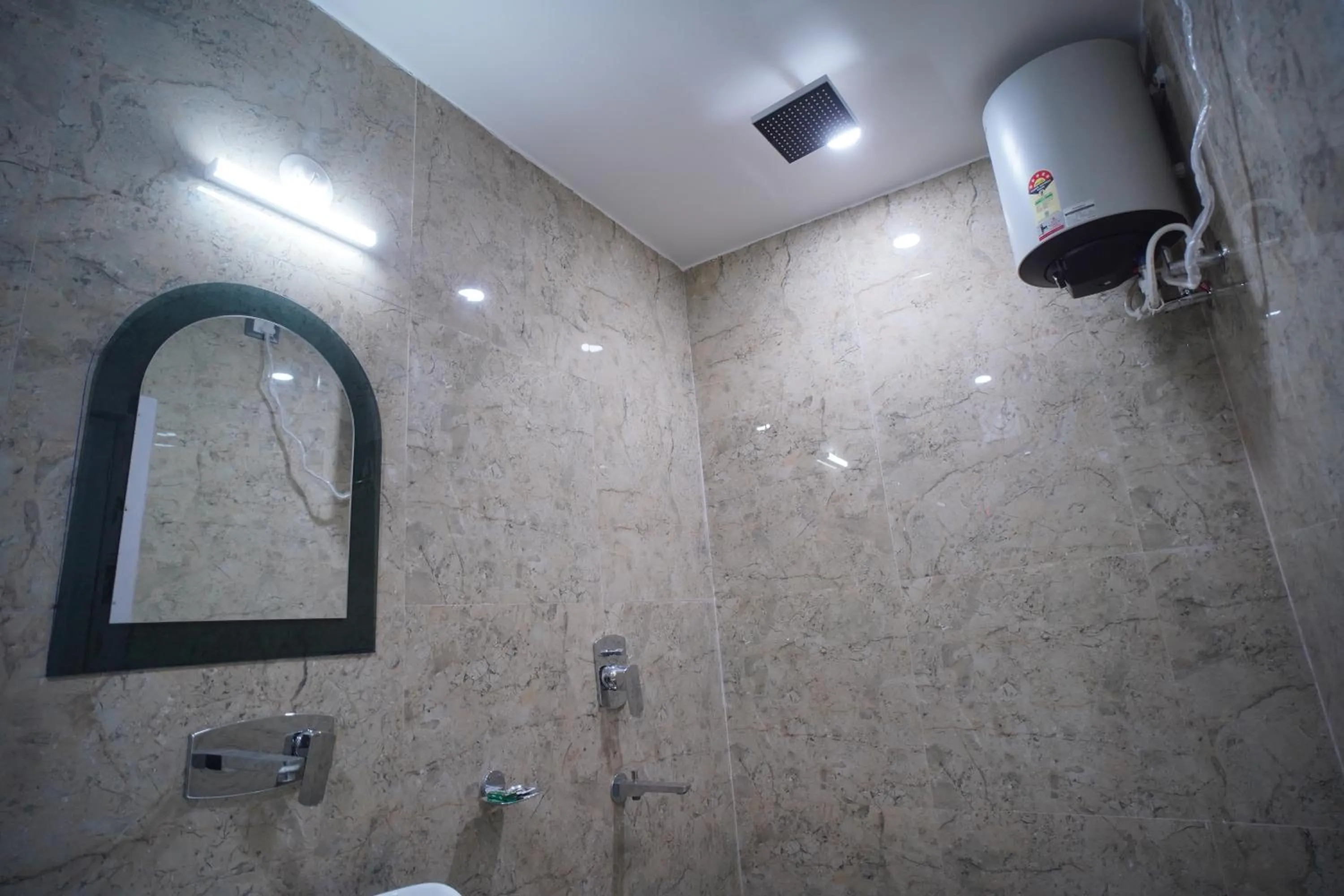 Bathroom in Hotel Asha Inn