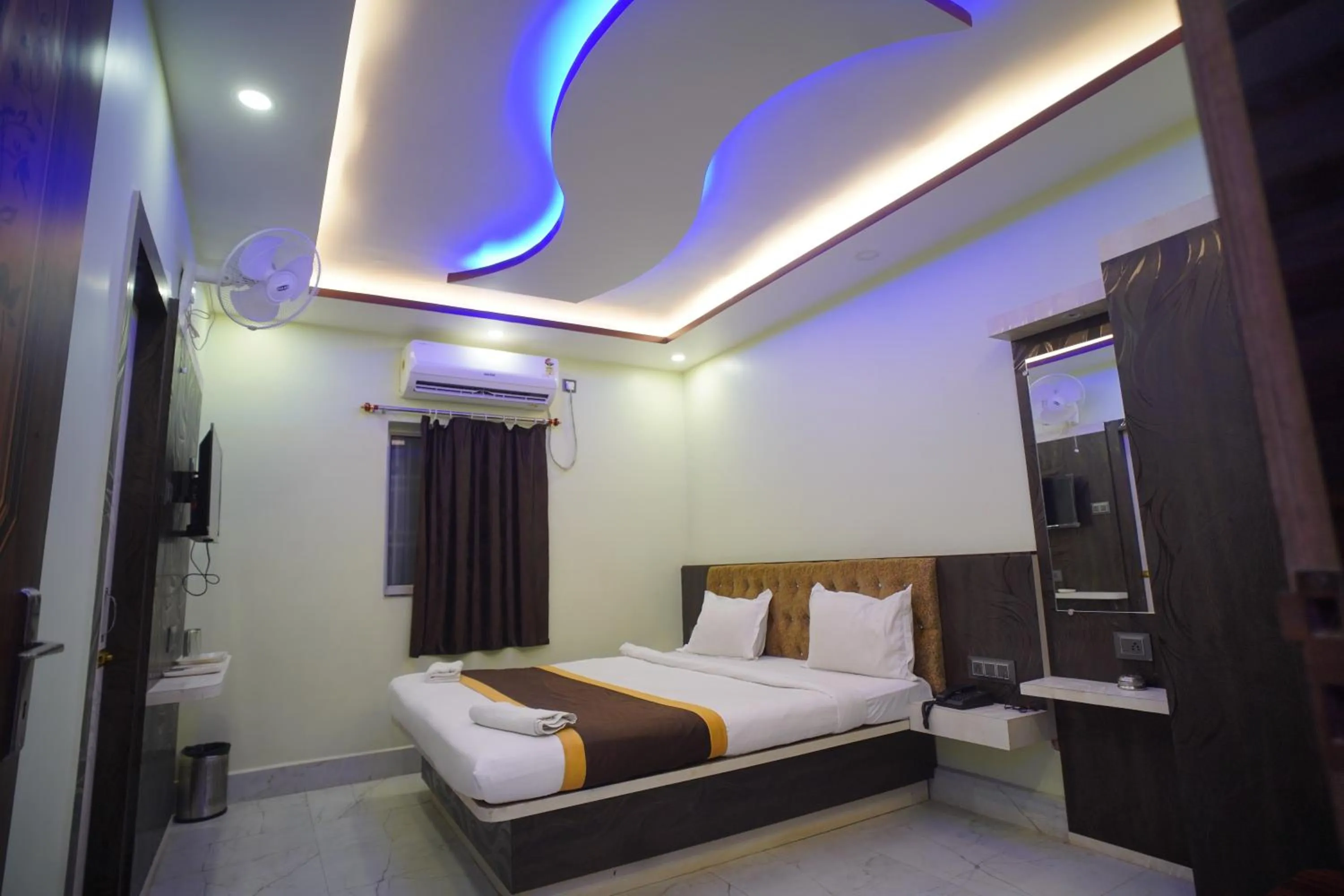 Bedroom in Hotel Asha Inn