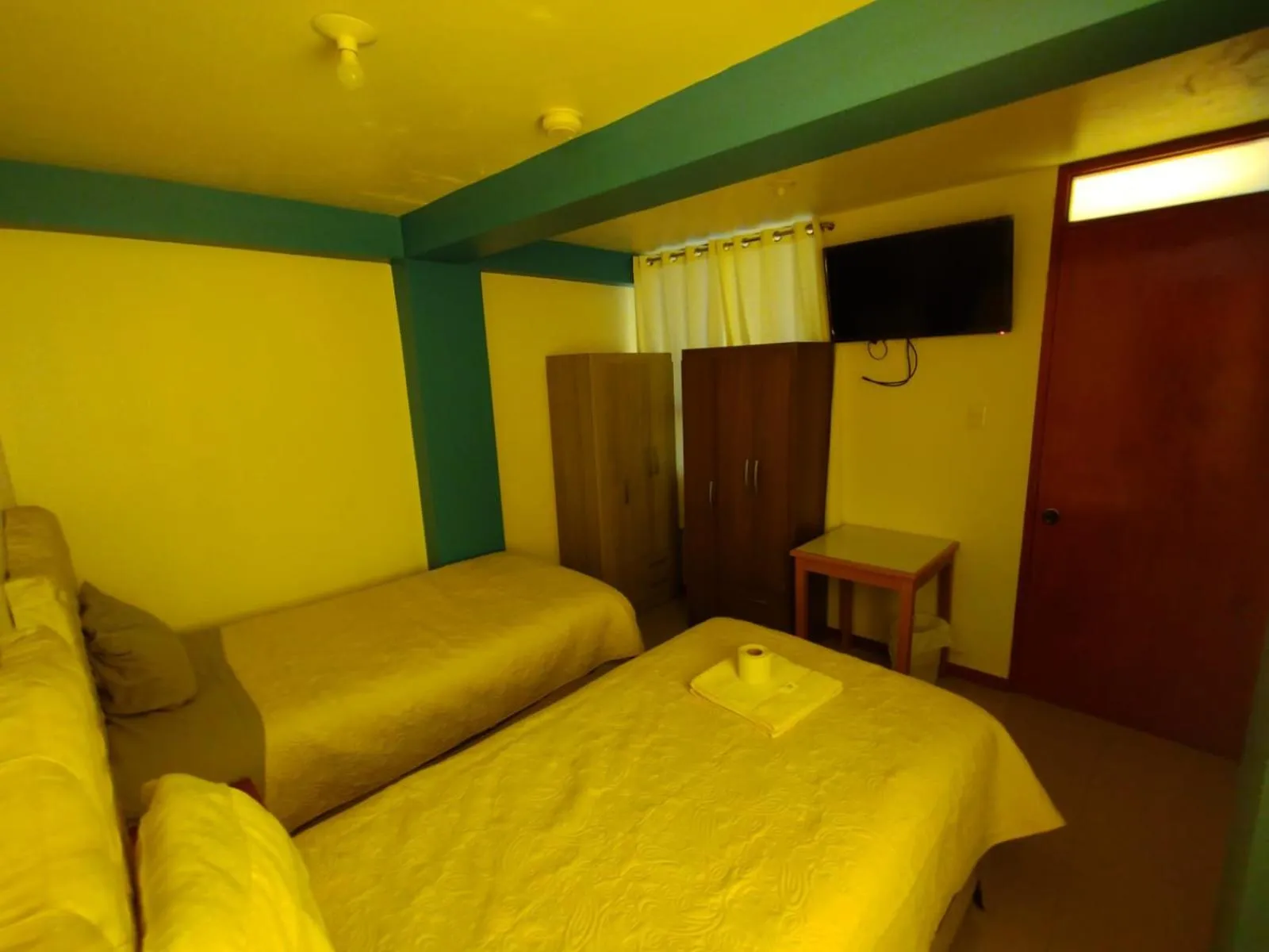 Bed in hotel plaza chinchero