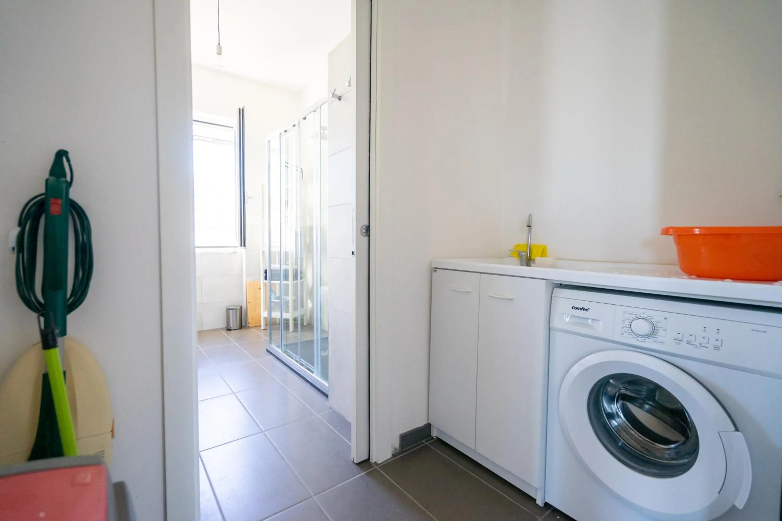 washing machine in +61 Lounge Apartment