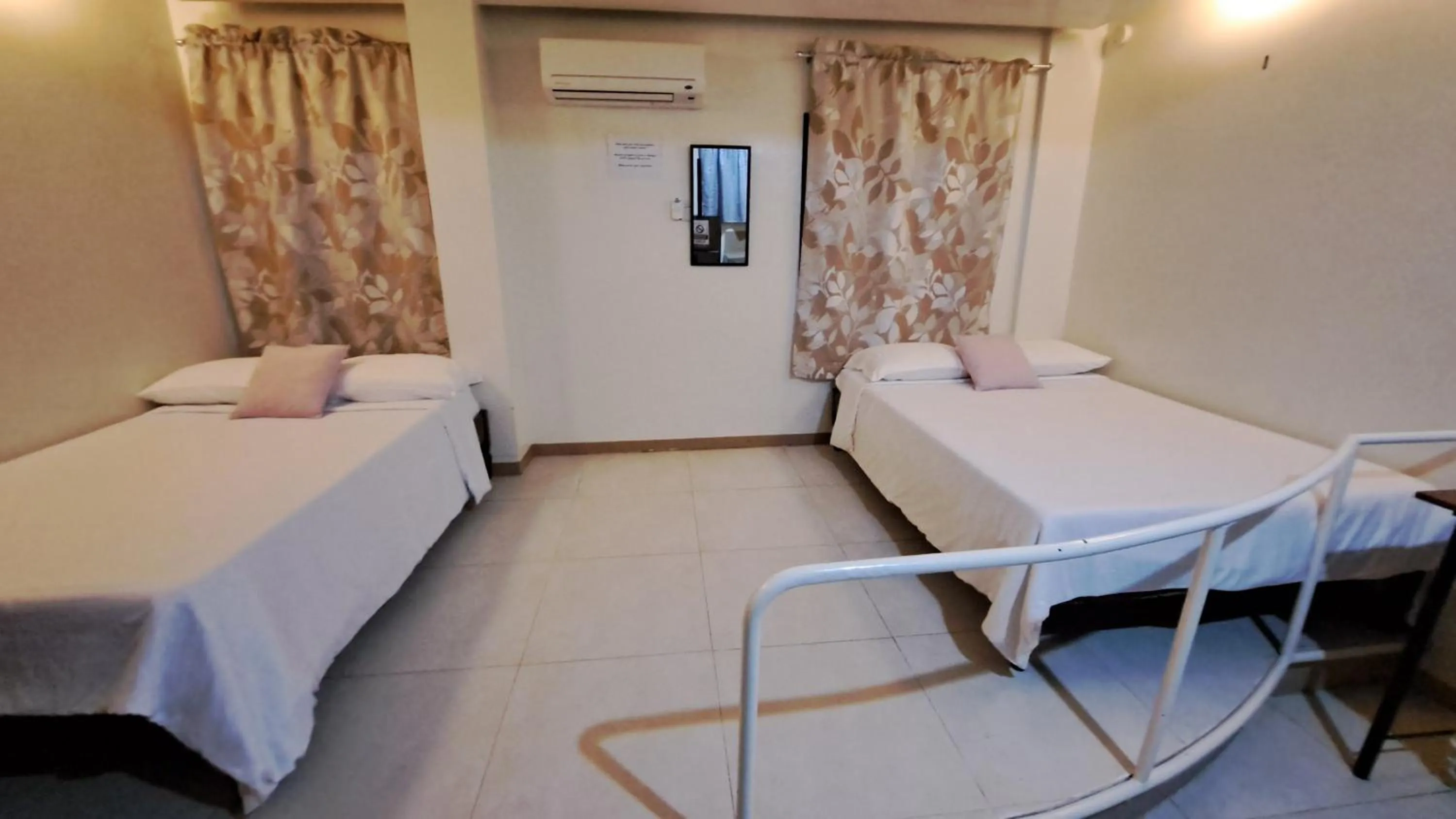 Bed in Villa Pamana Inn Puerto Galera powered by Cocotel