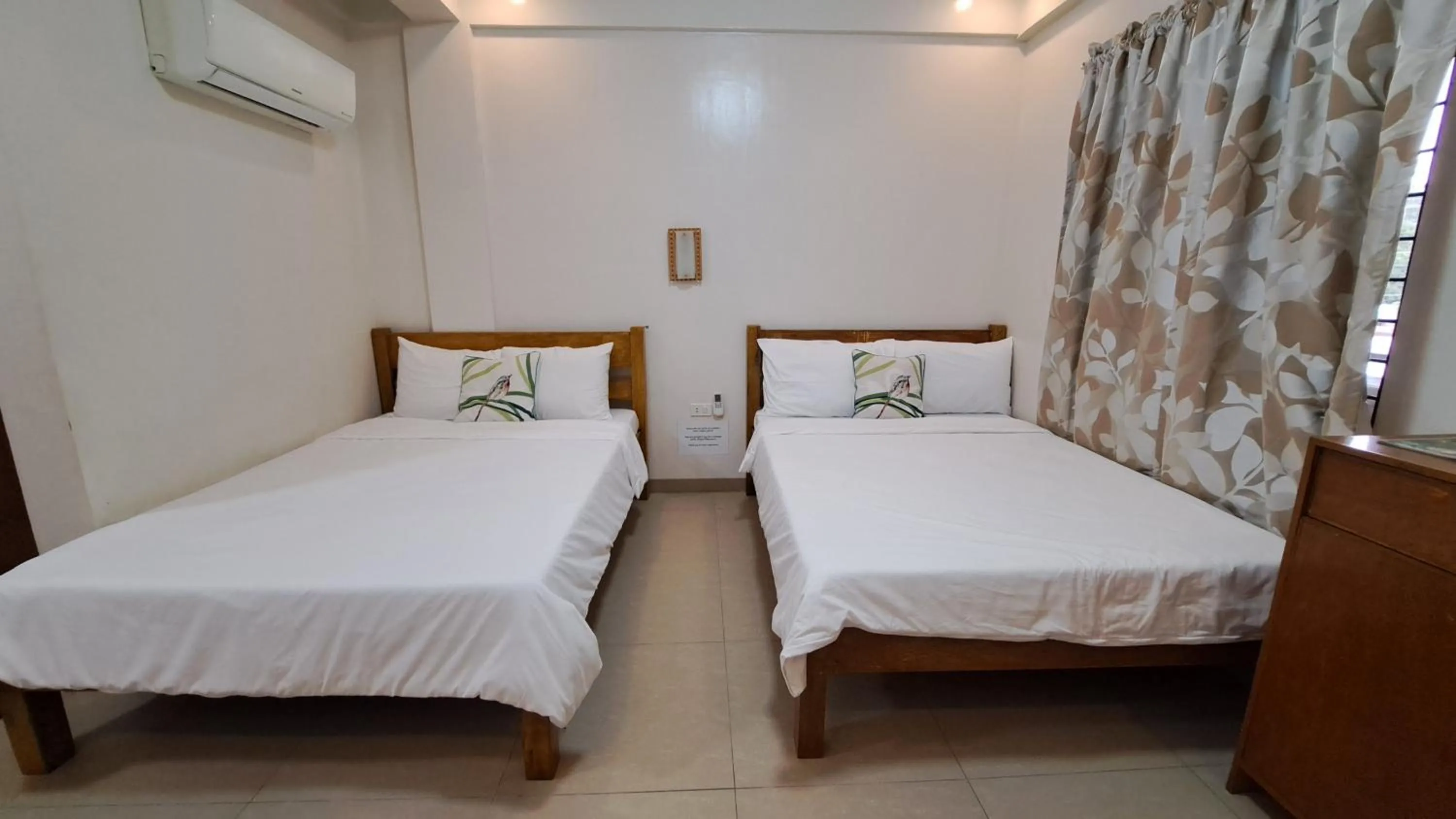 Bed in Villa Pamana Inn Puerto Galera powered by Cocotel