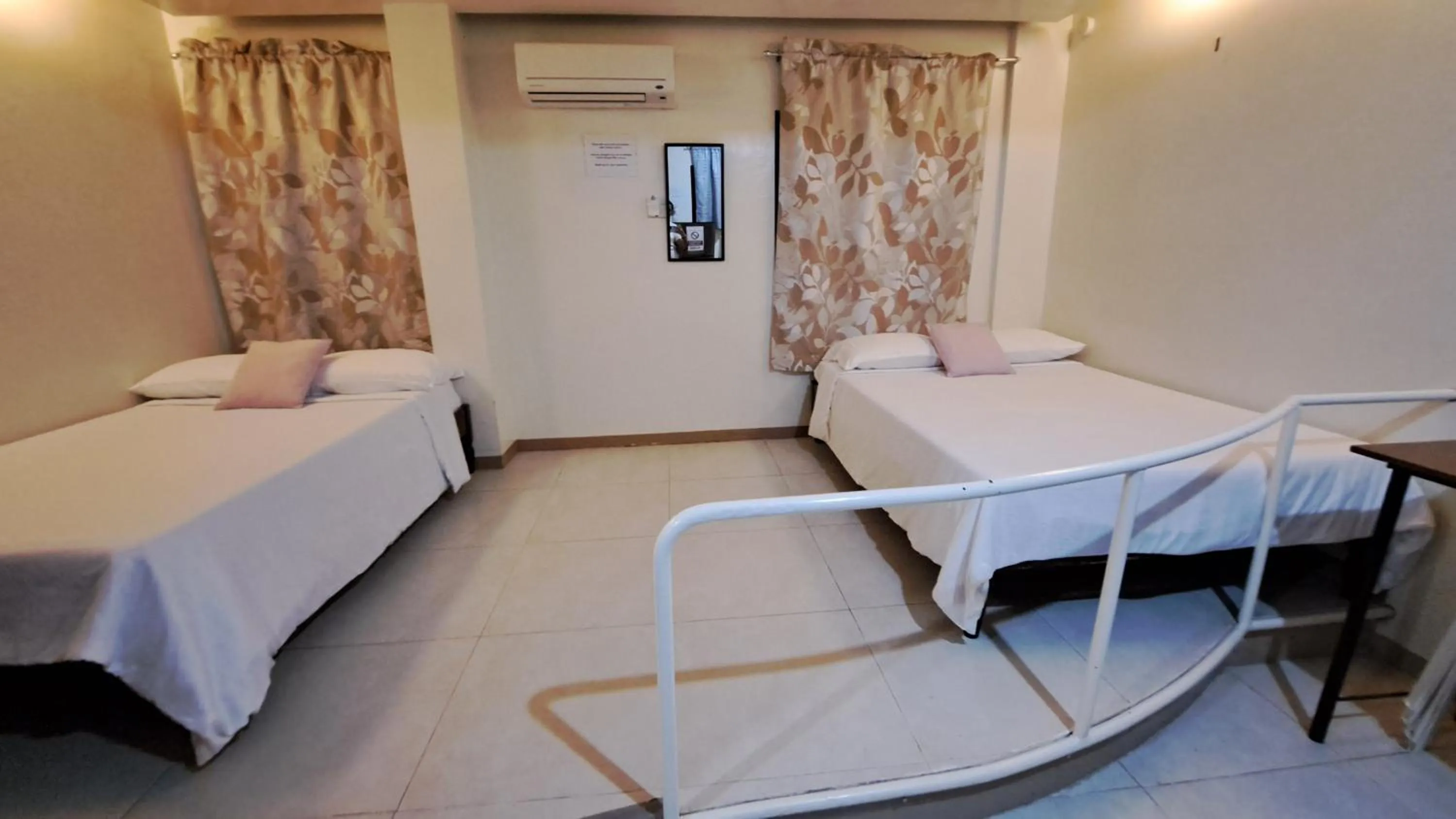 Bed in Villa Pamana Inn Puerto Galera powered by Cocotel