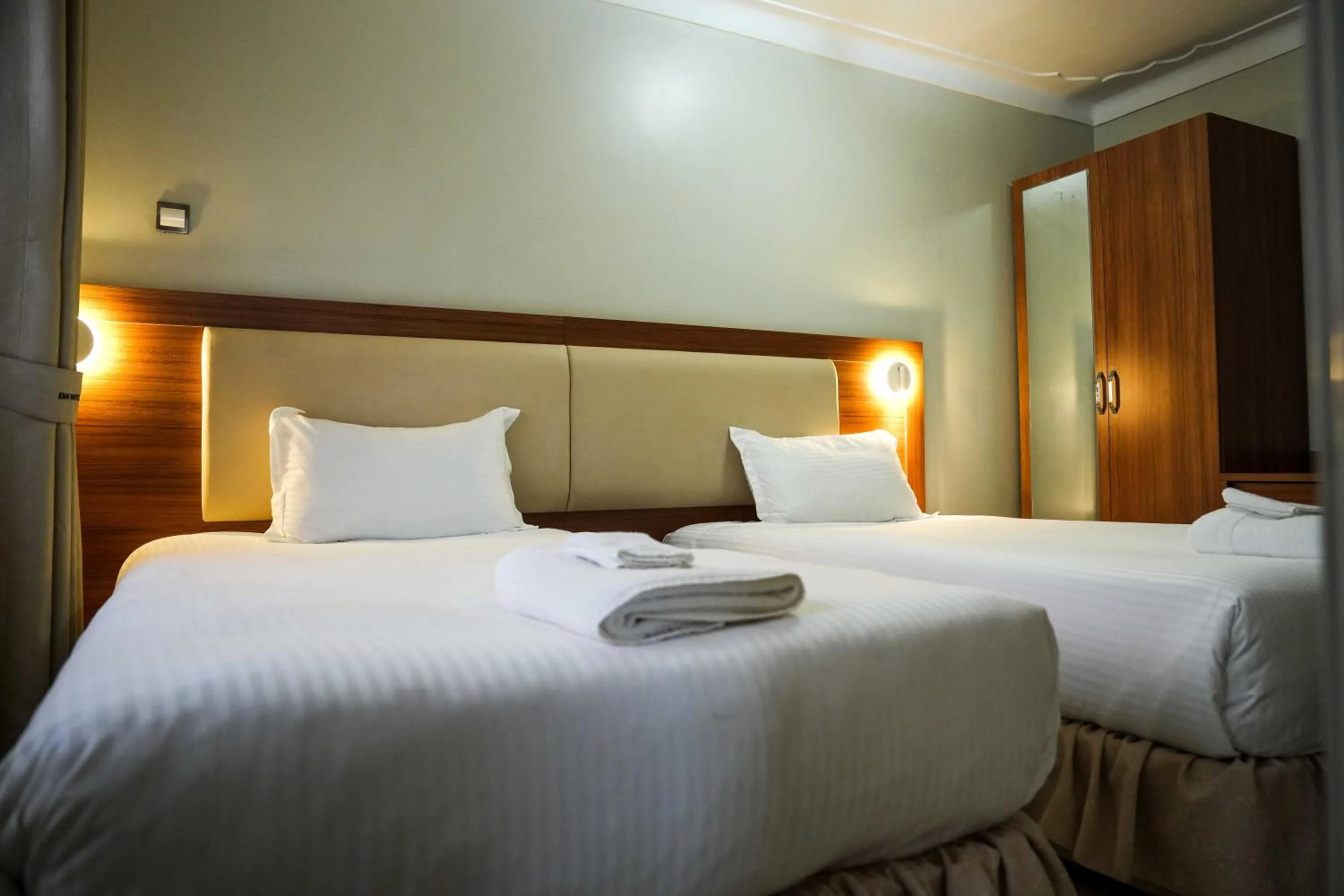 Bedroom, Bed in ENN Business Hotel