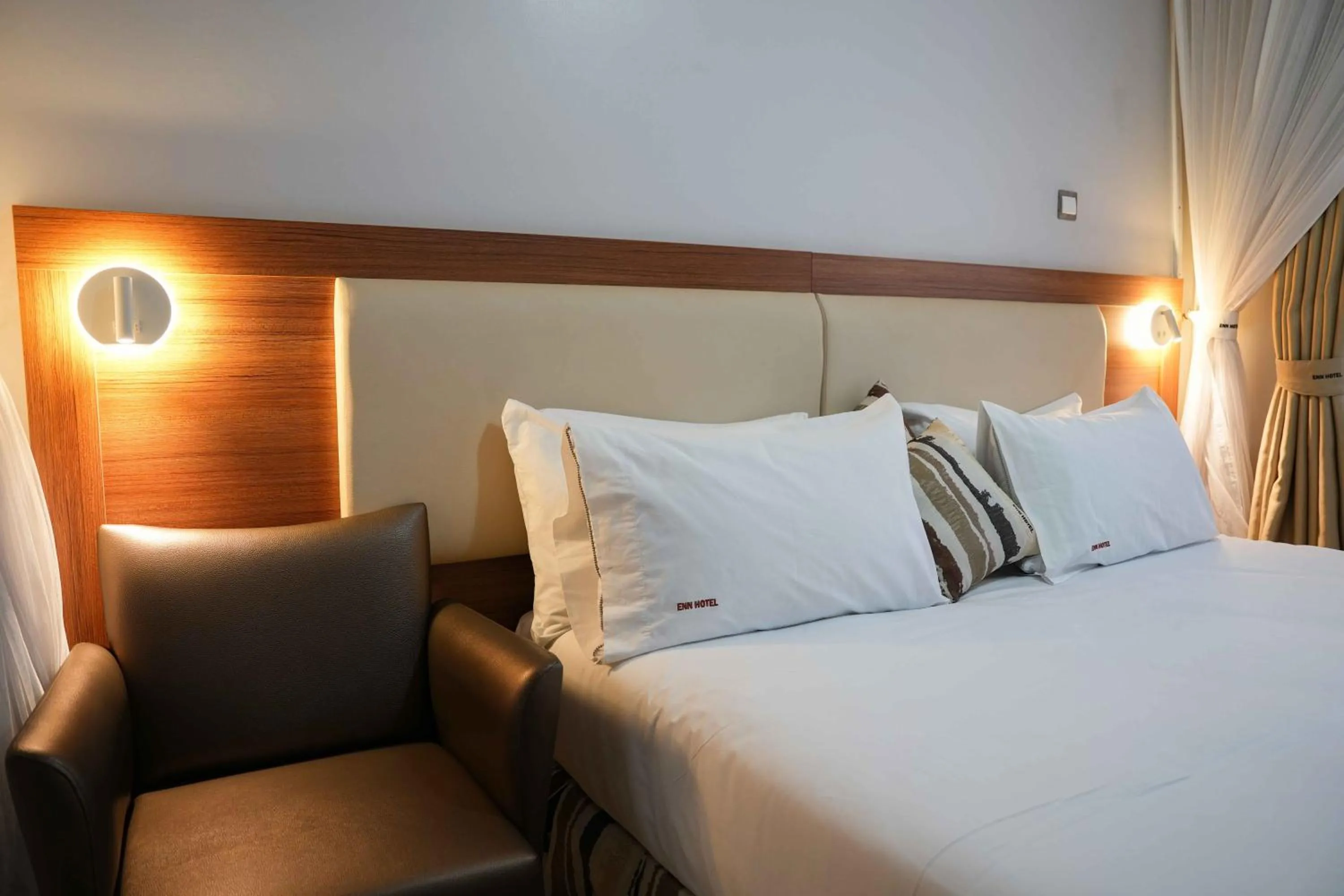 Bedroom, Bed in ENN Business Hotel