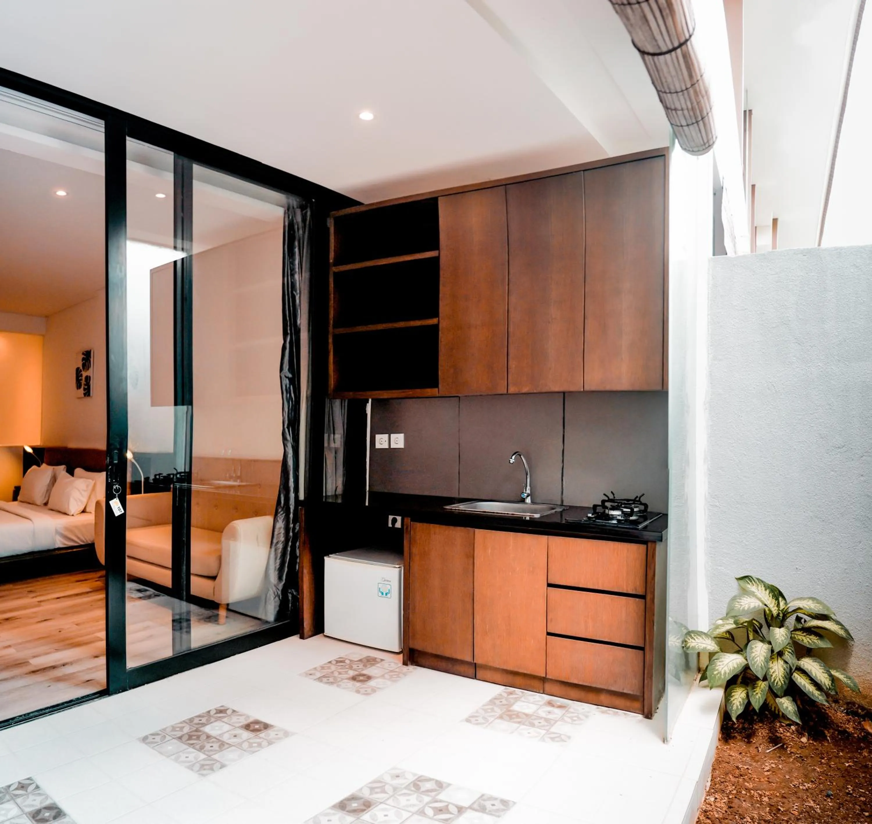 Bed in Sunrise Suite Seminyak by ARM Hospitality