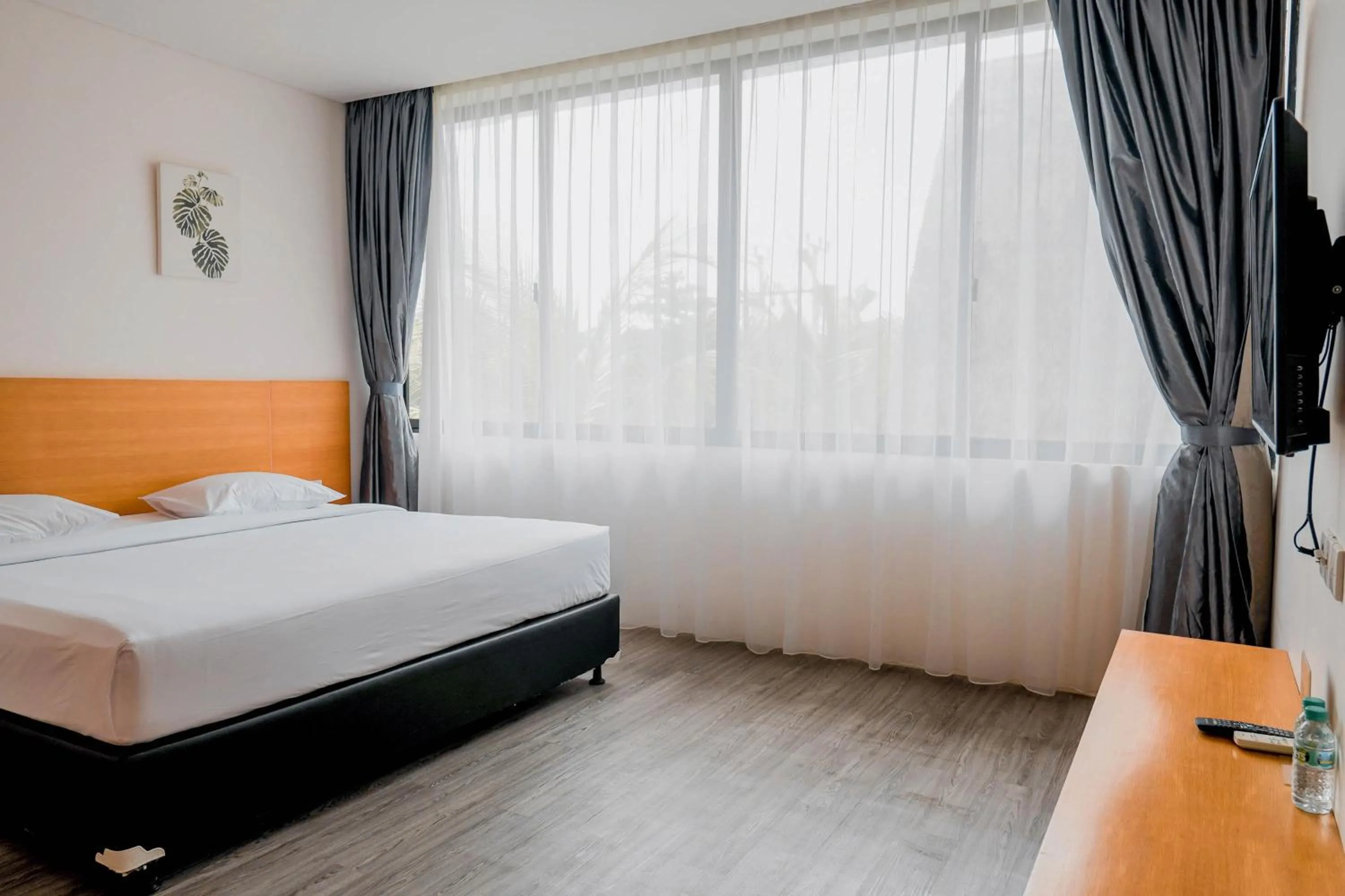 Communal lounge/ TV room, Bed in Sunrise Suite Seminyak by ARM Hospitality