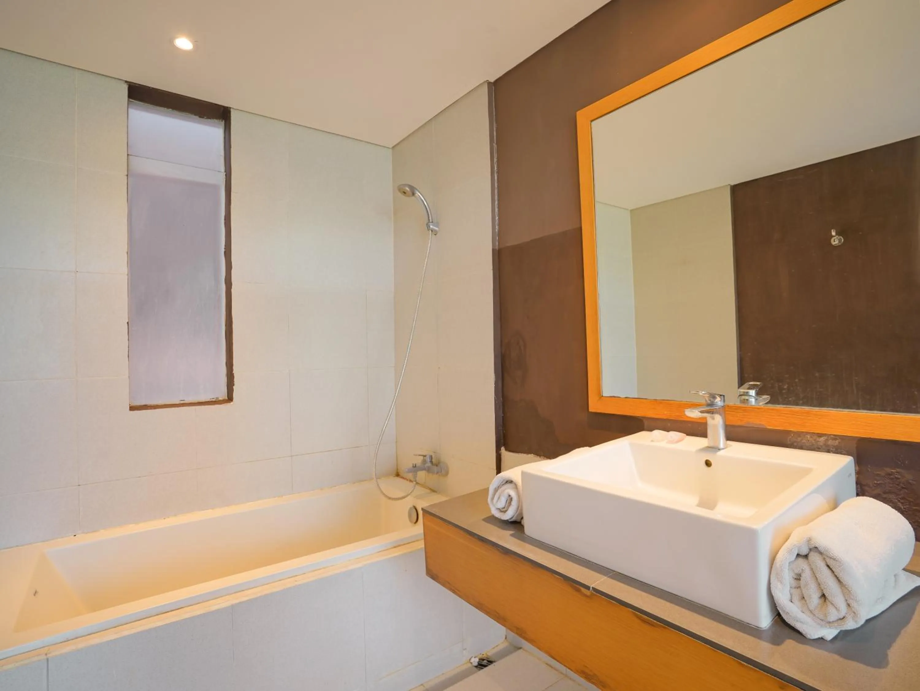 Bed in Sunrise Suite Seminyak by ARM Hospitality