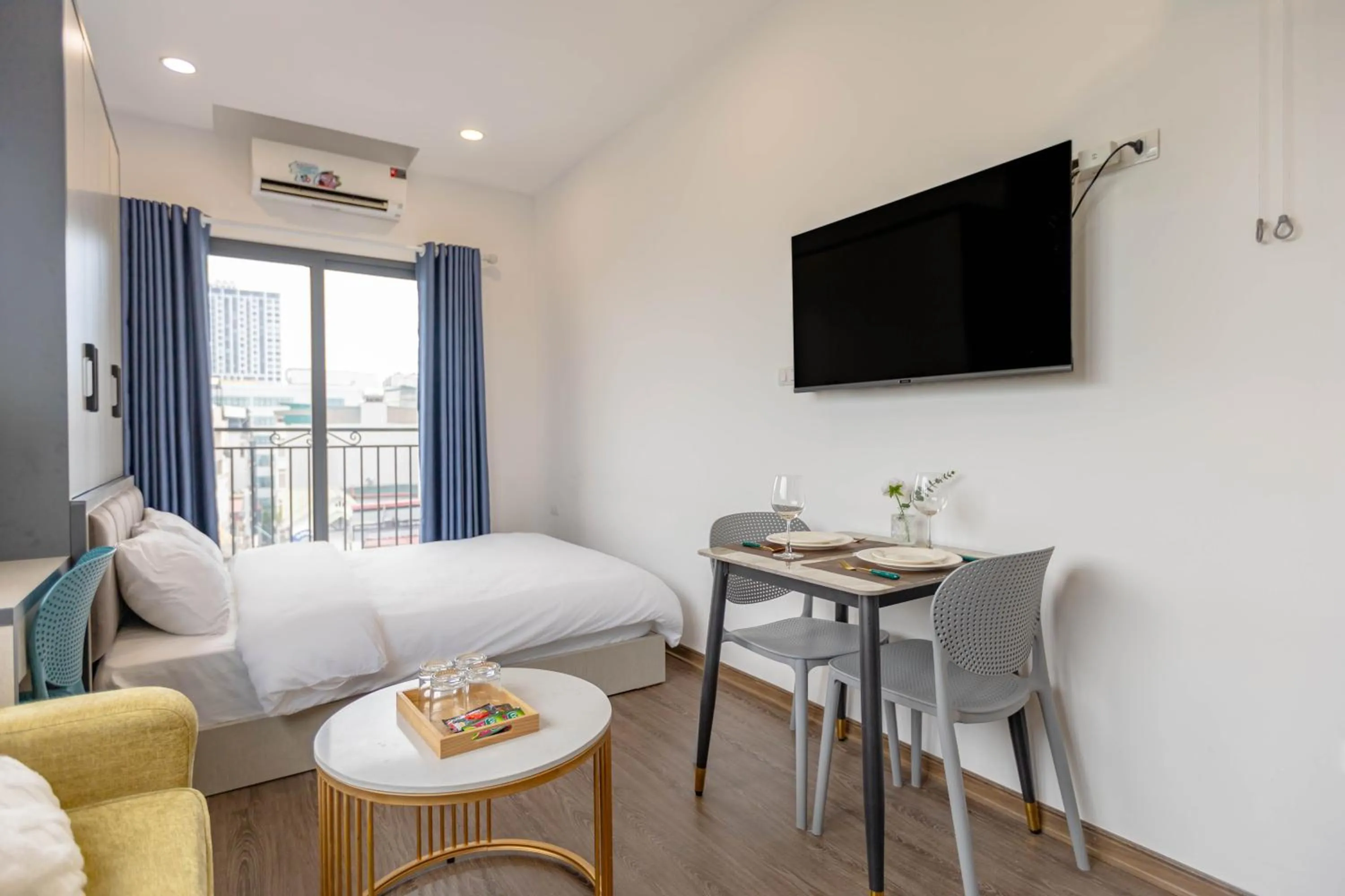 Bed in LUMI Hotel & Apartment