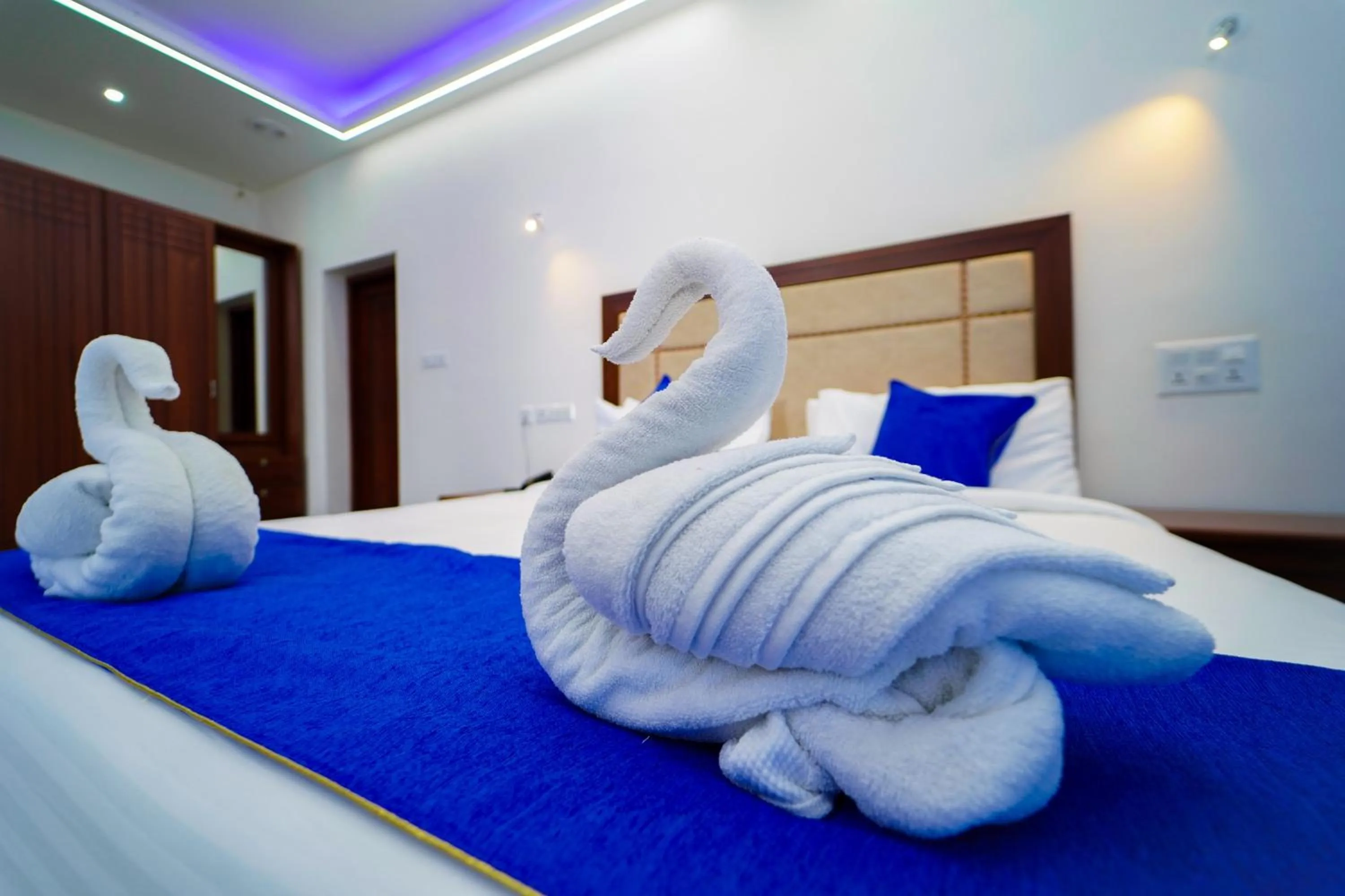 Bed in Skylar Seaview Beach Resort & Ayurveda Varkala