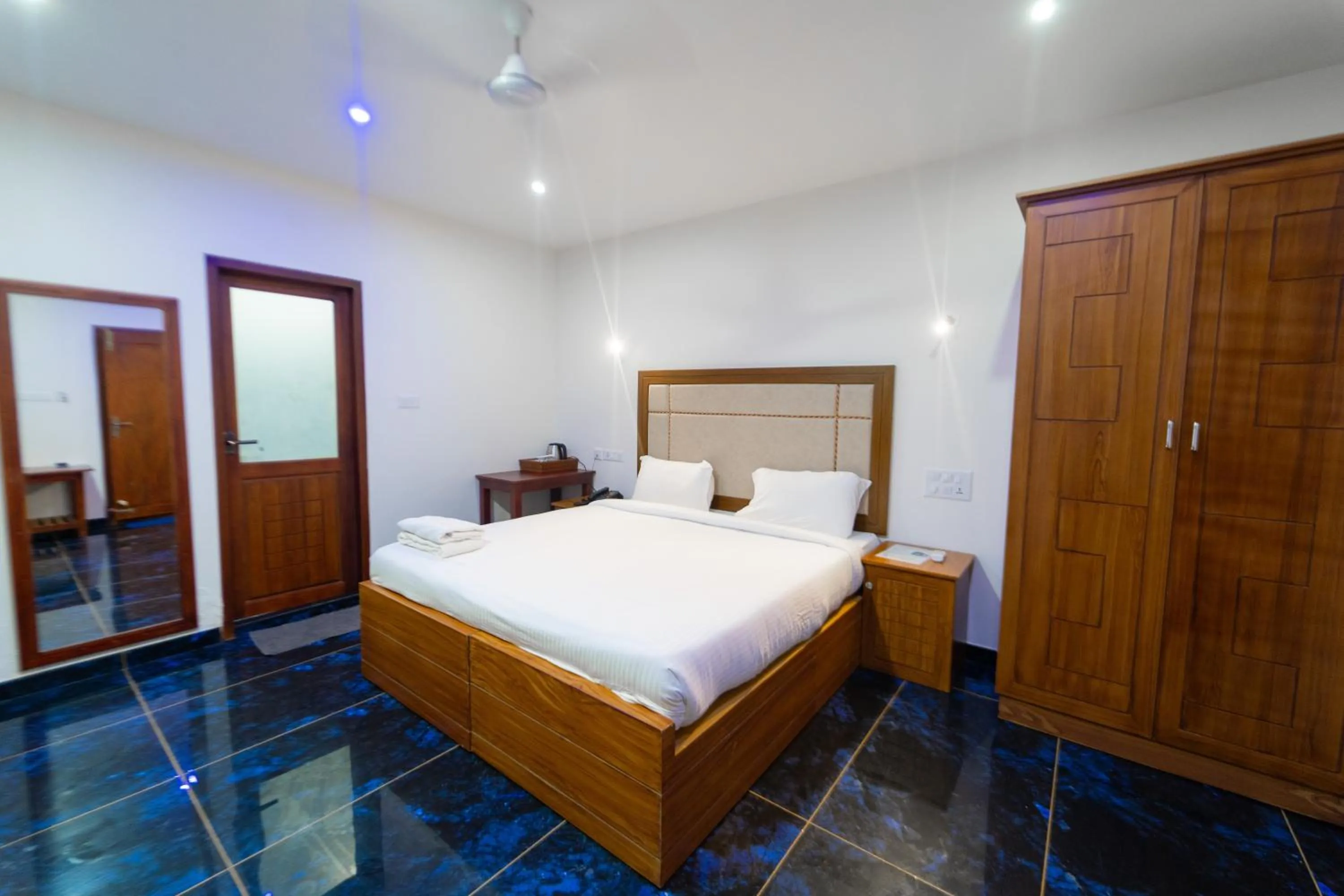 Bed in Skylar Seaview Beach Resort & Ayurveda Varkala