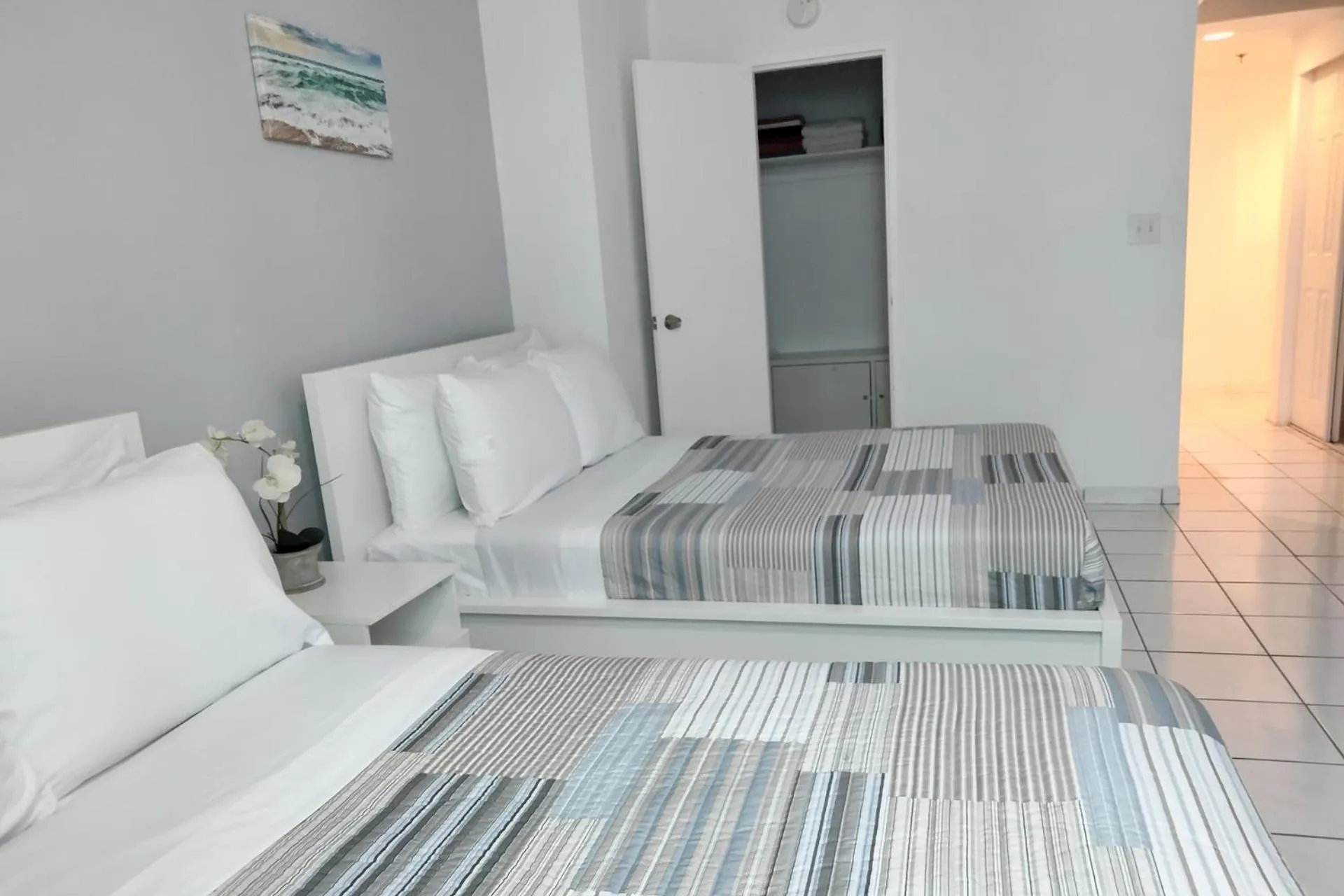 Bed in Miami Beach Apartments by MiaRentals