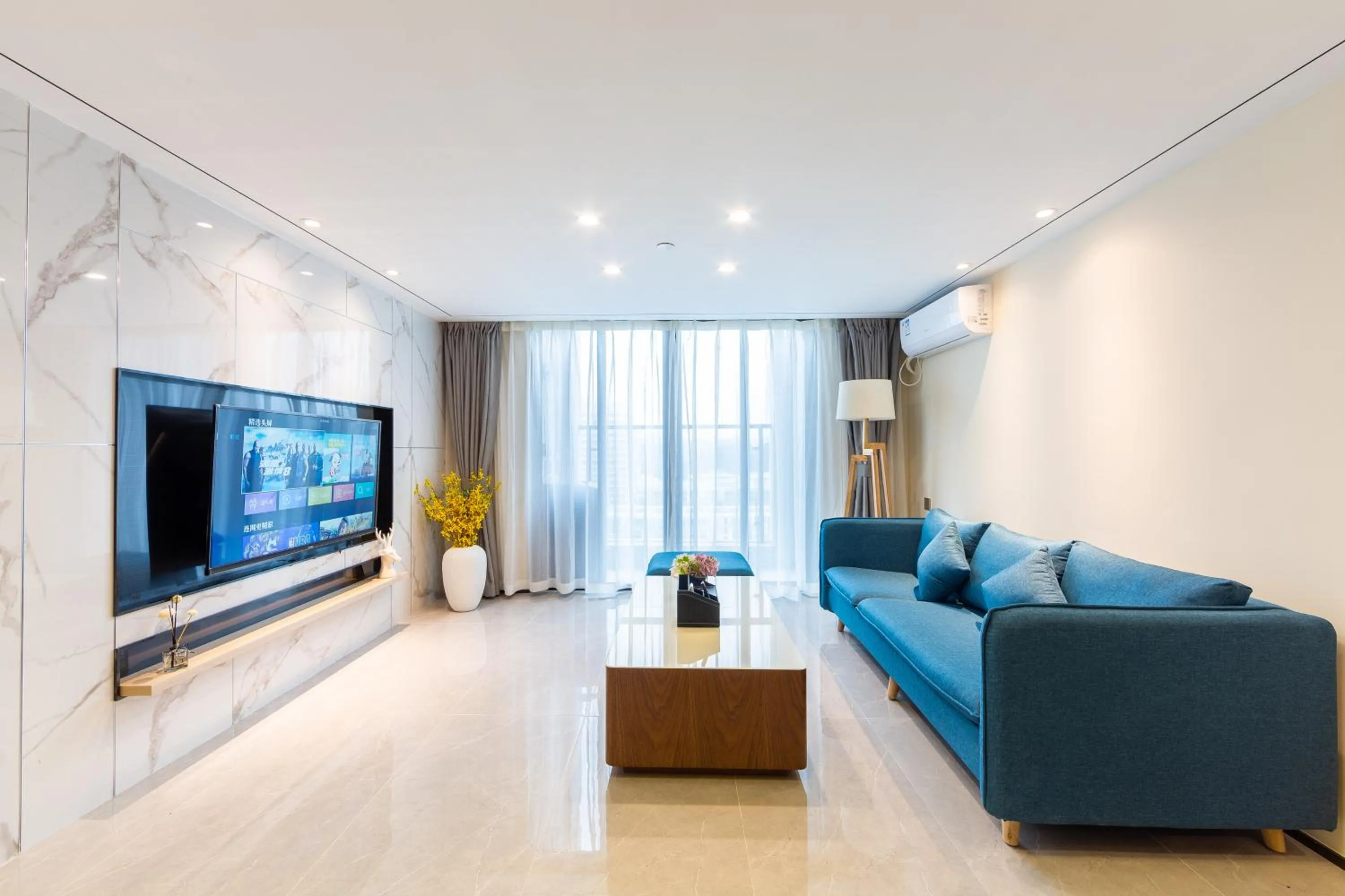 TV and multimedia in Serveyou International Apartment - Free Airport Pickup Service & Free Canton Fair Shuttle Bus