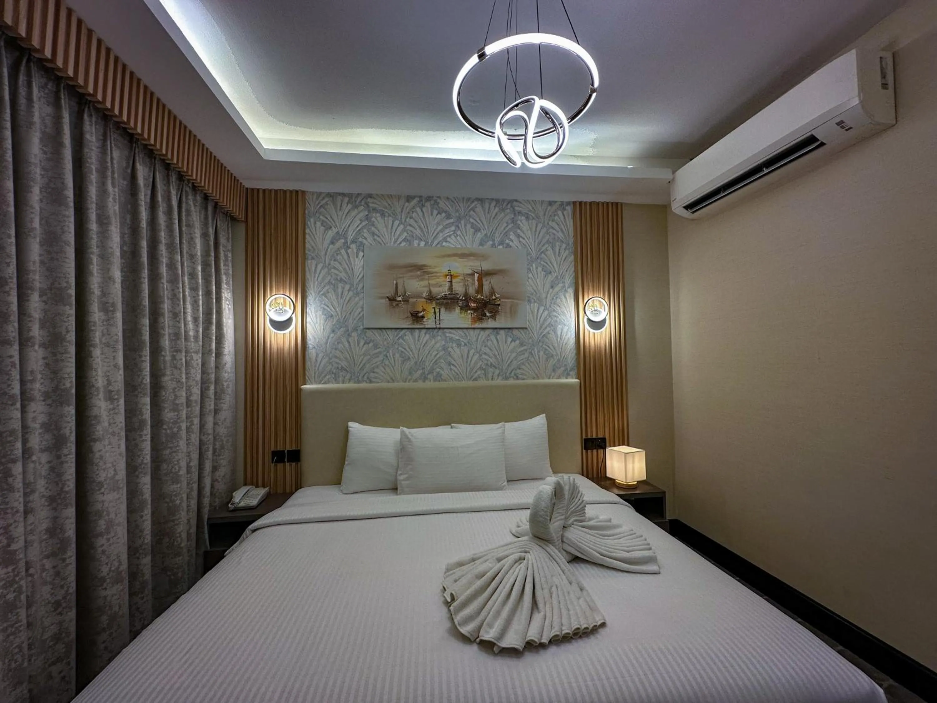 Photo of the whole room, Bed in GOLD SKY AVENUE HOTEL